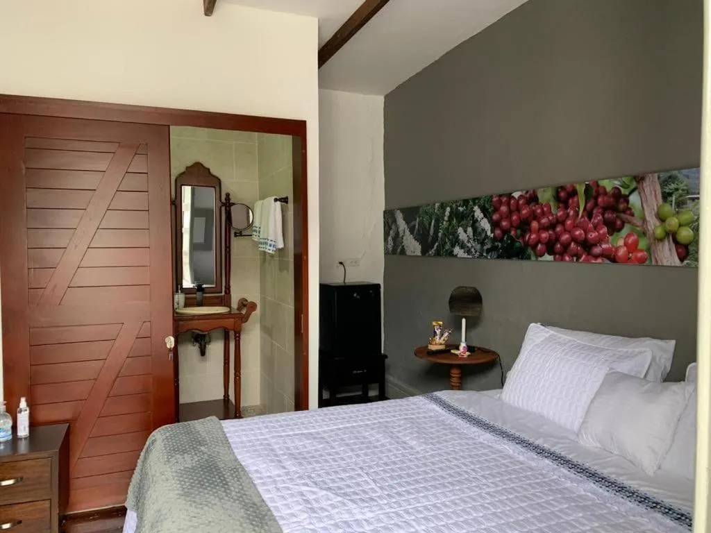Bed in La Estancia Hotel Boutique