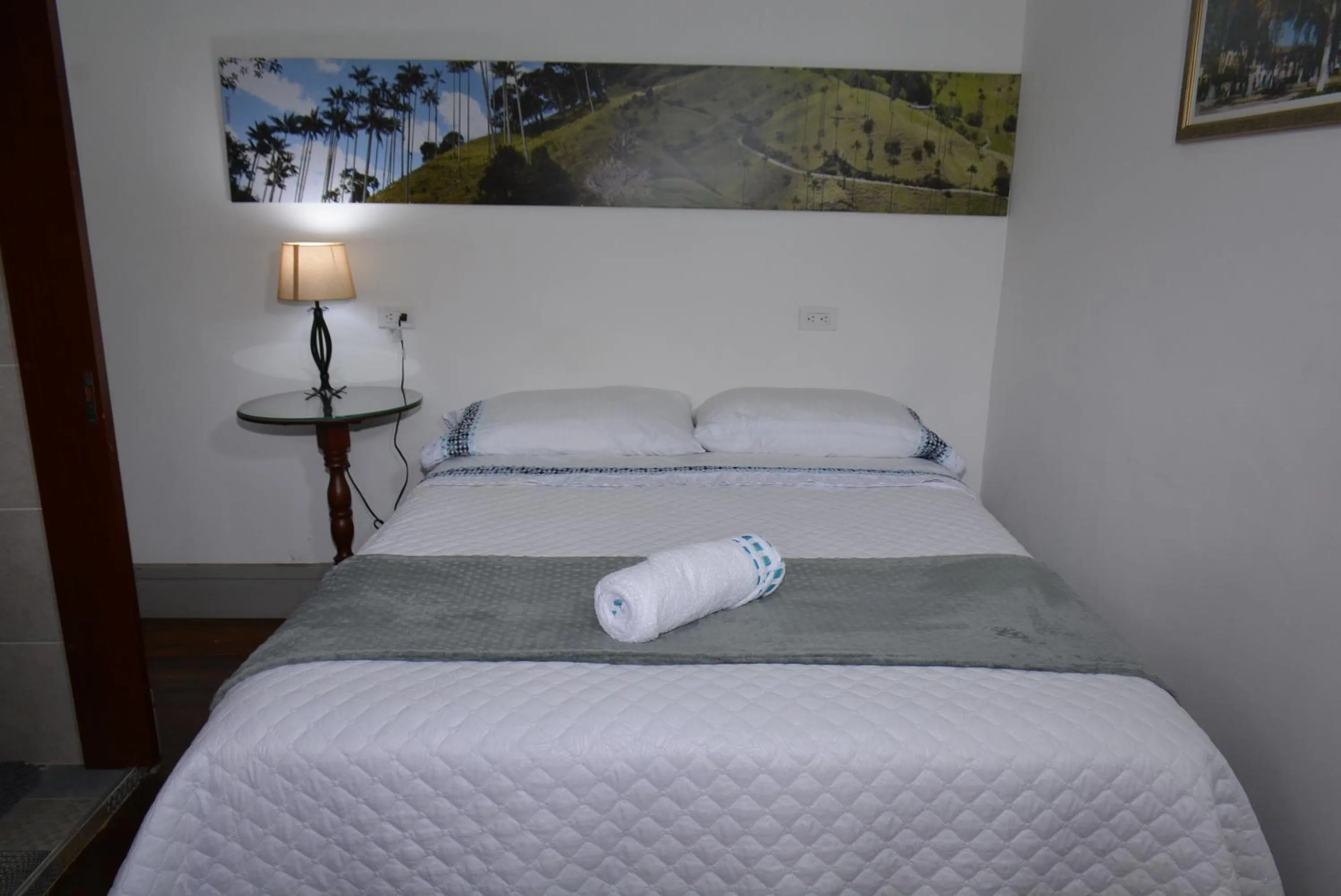 Bed in La Estancia Hotel Boutique