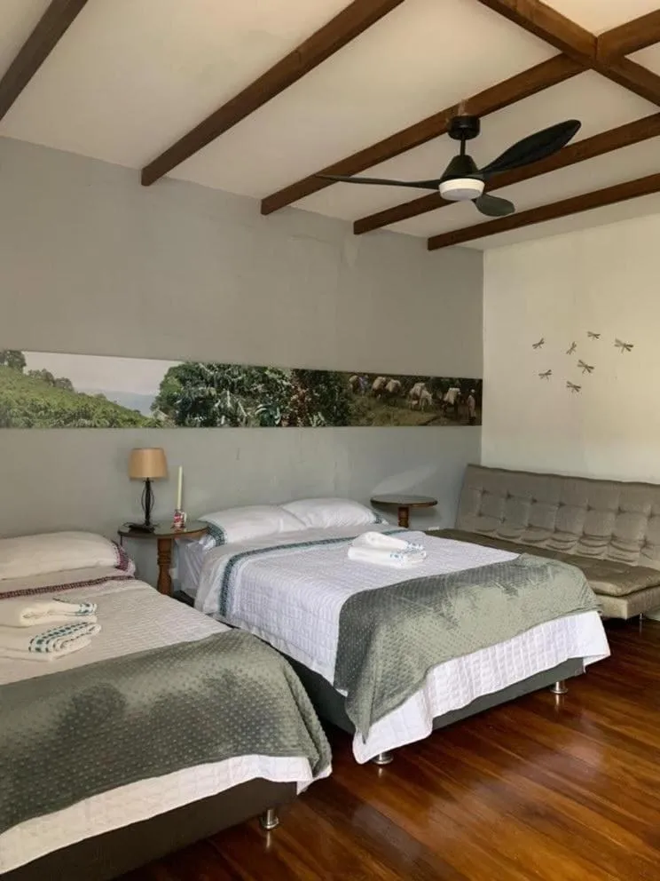 Bed in La Estancia Hotel Boutique