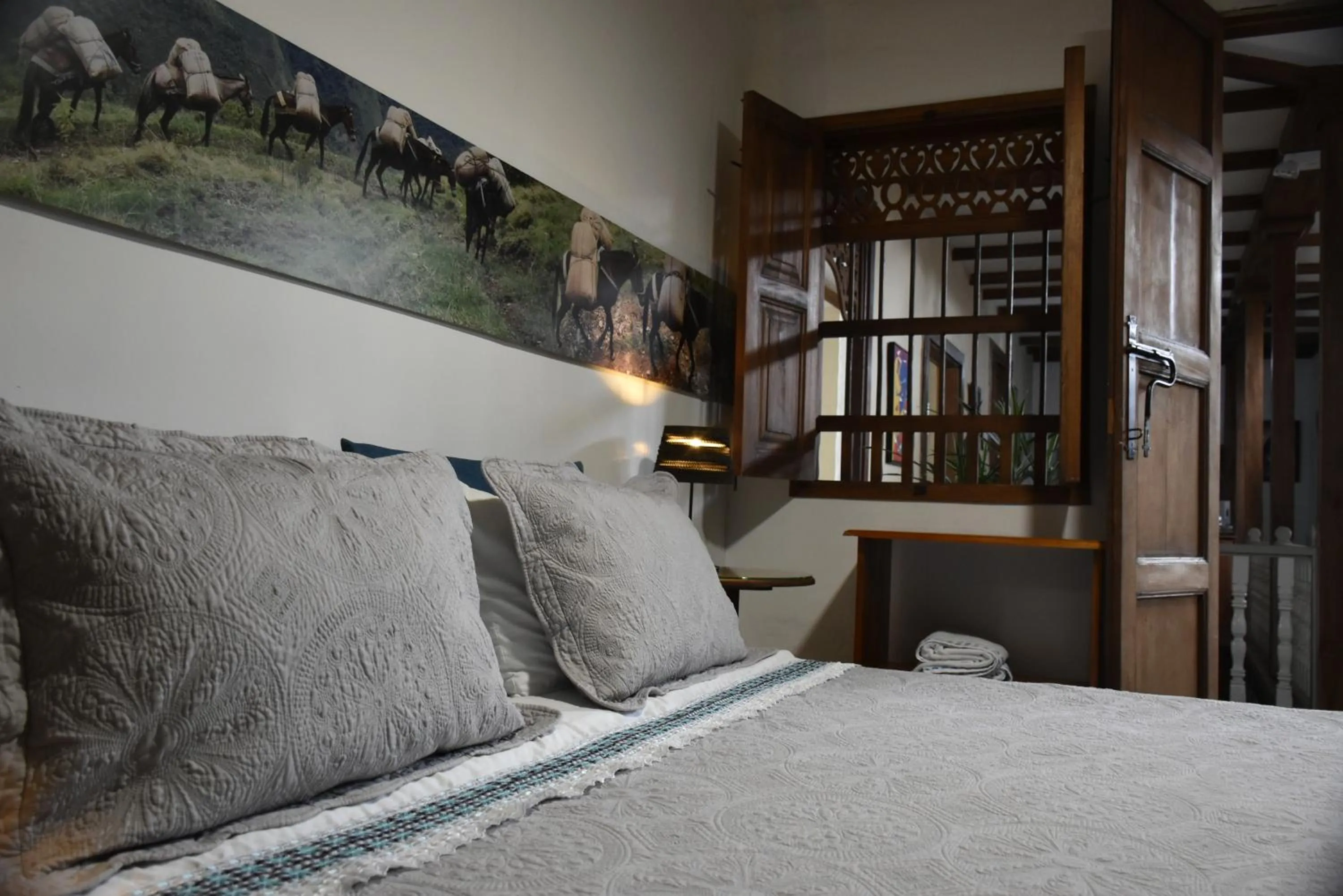 Bed in La Estancia Hotel Boutique