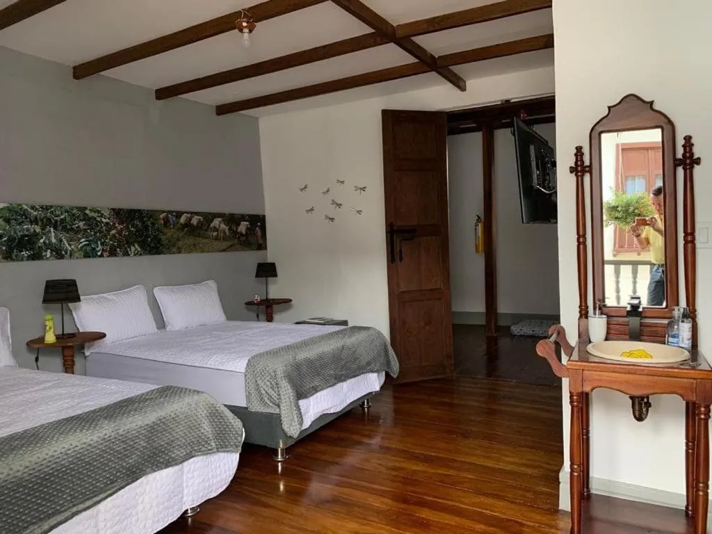 Bed in La Estancia Hotel Boutique