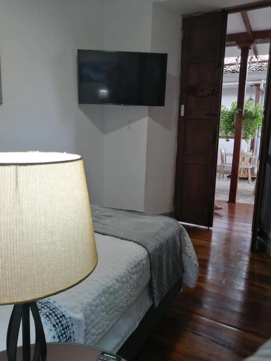 Bed in La Estancia Hotel Boutique