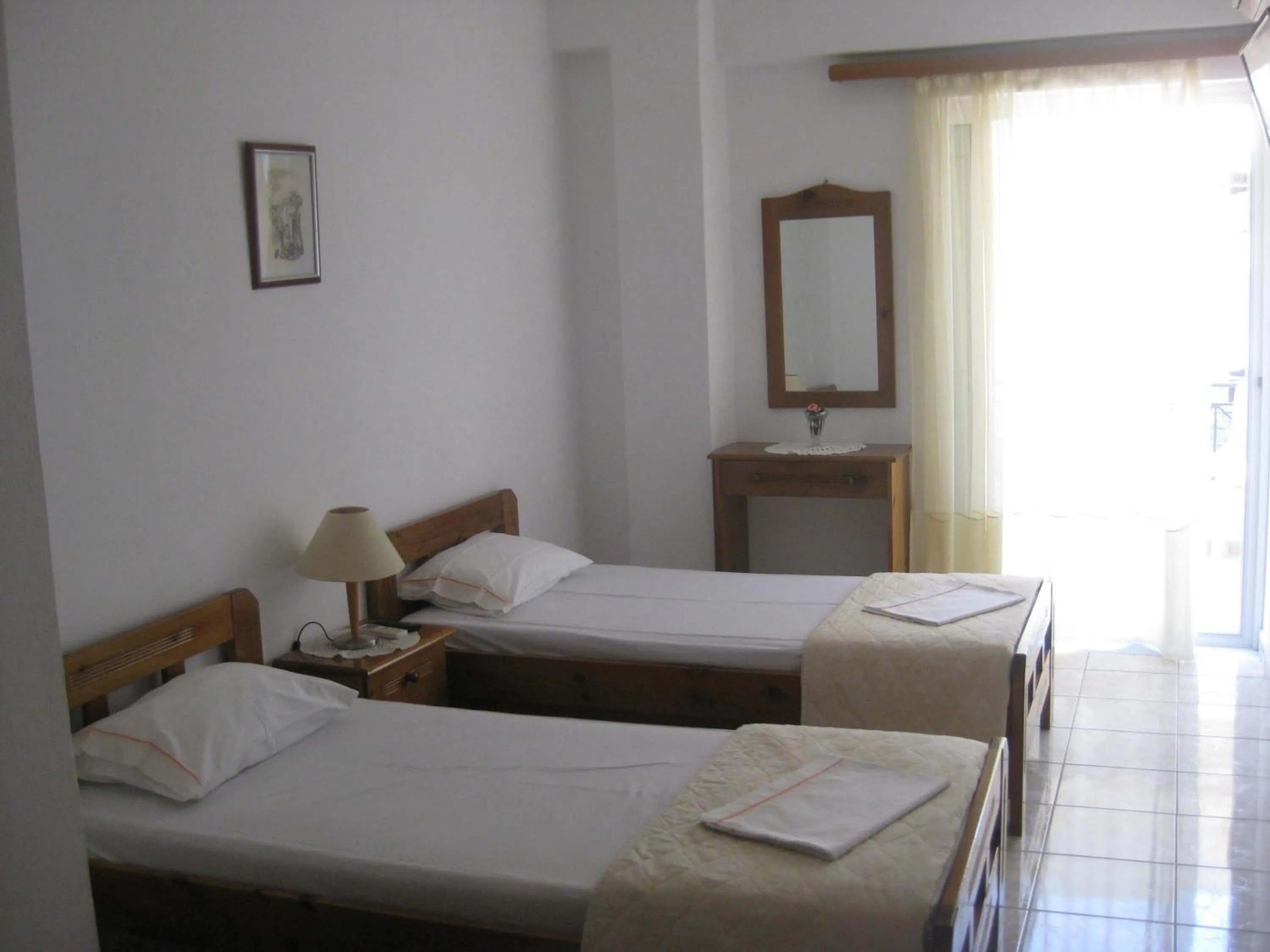 Photo of the whole room, Bed in Agalos Studios