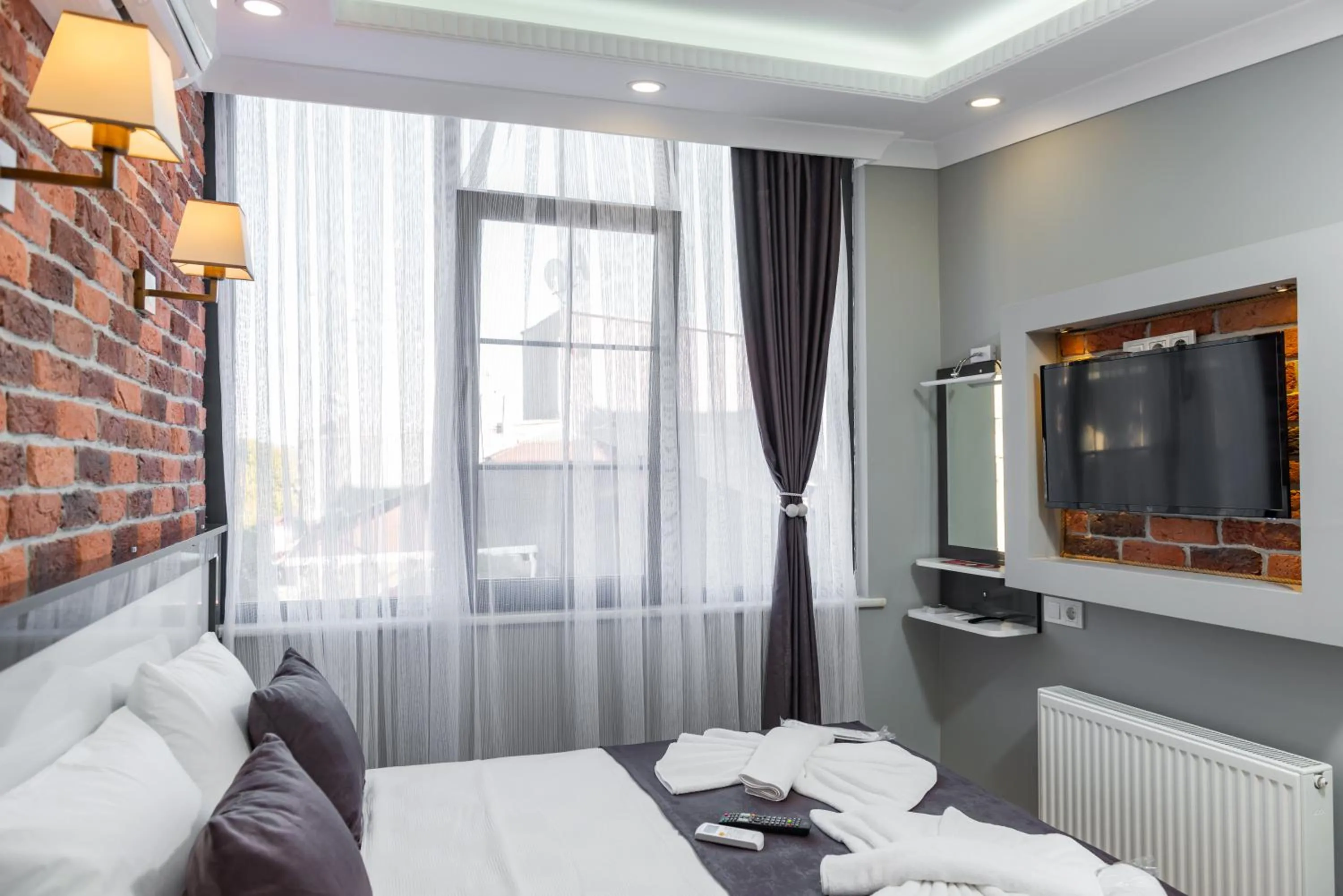 Bedroom, Bed in Gloria Suites Old City