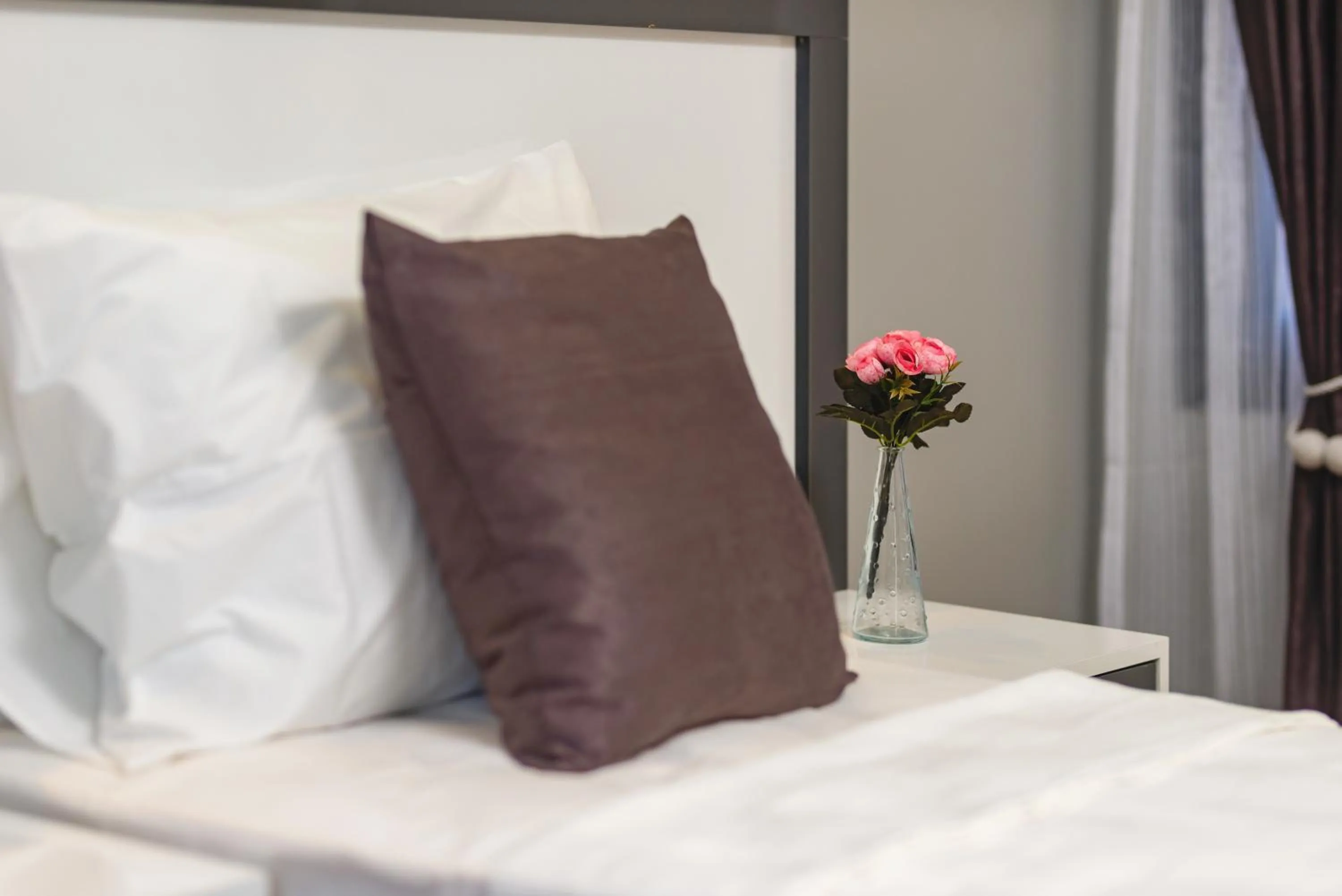 Bed in Gloria Suites Old City