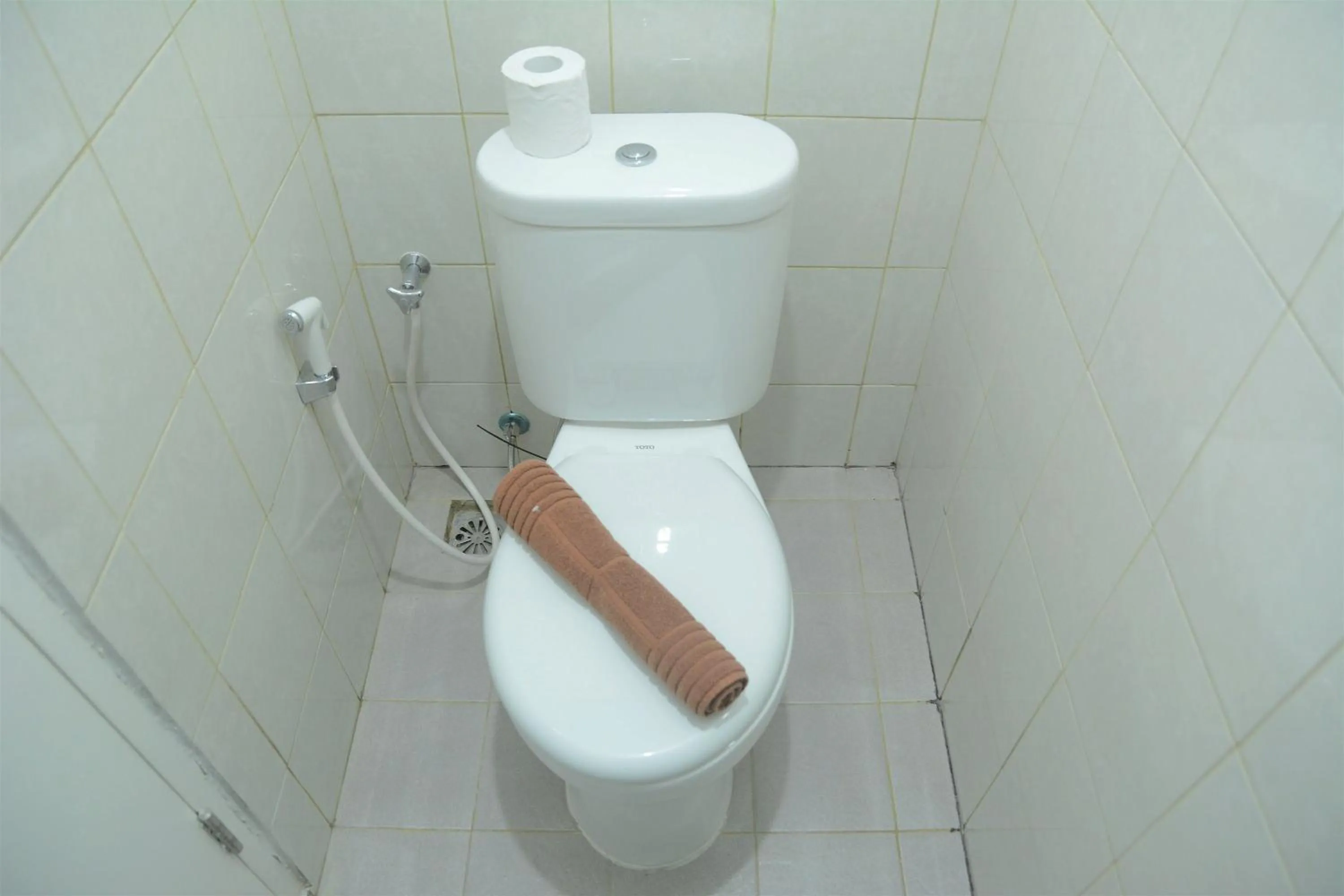 Bathroom in Comfy Studio Poris 88 Apartment By Travelio