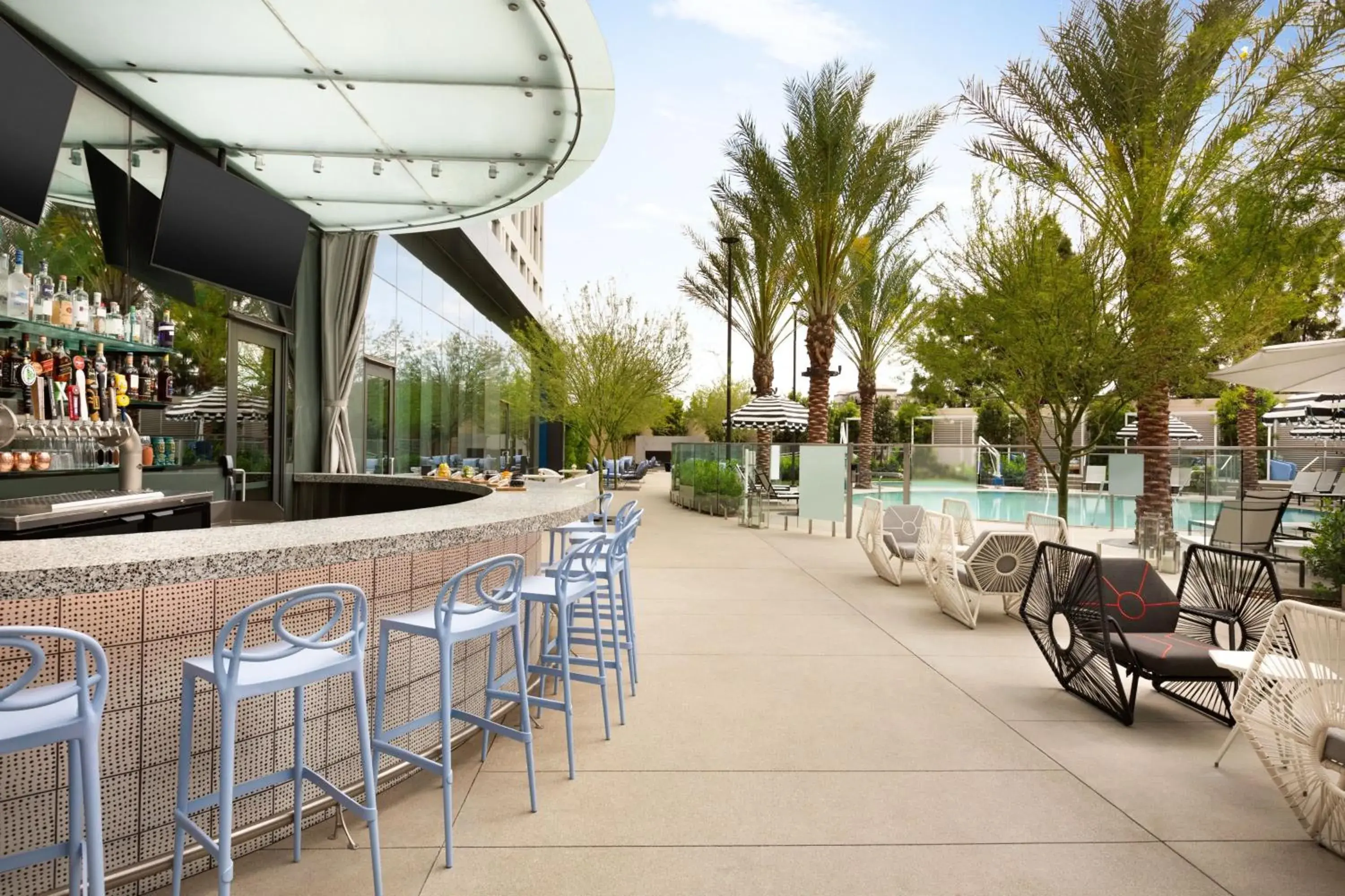 Lounge or bar in The Viv Hotel, Anaheim, a Tribute Portfolio Hotel Lounge or bar in The Viv Hotel, Anaheim, a Tribute Portfolio Hotel