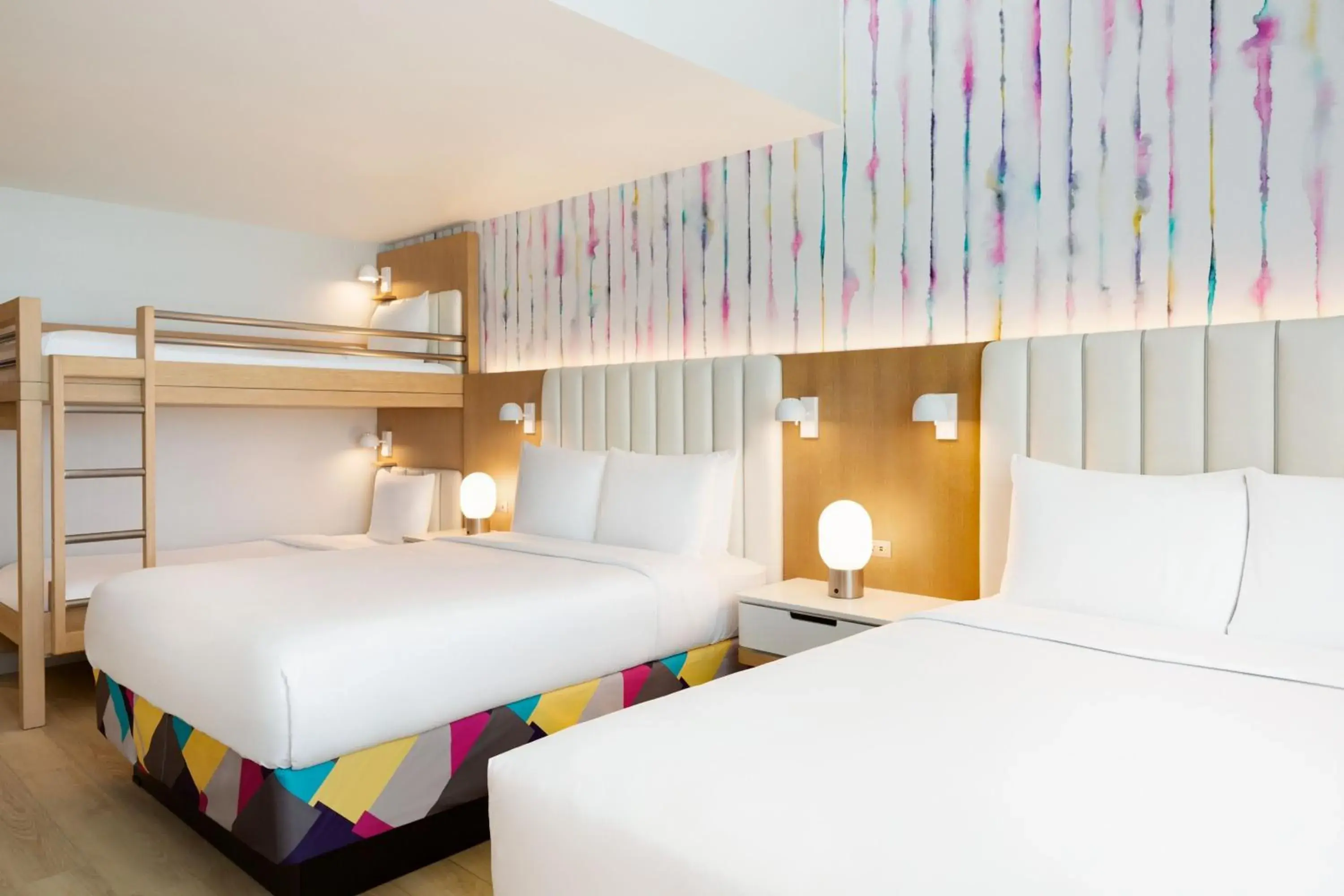 Queen Room with Two Queen Beds and Bunk Beds in The Viv Hotel, Anaheim, a Tribute Portfolio Hotel Queen Room with Two Queen Beds and Bunk Beds in The Viv Hotel, Anaheim, a Tribute Portfolio Hotel