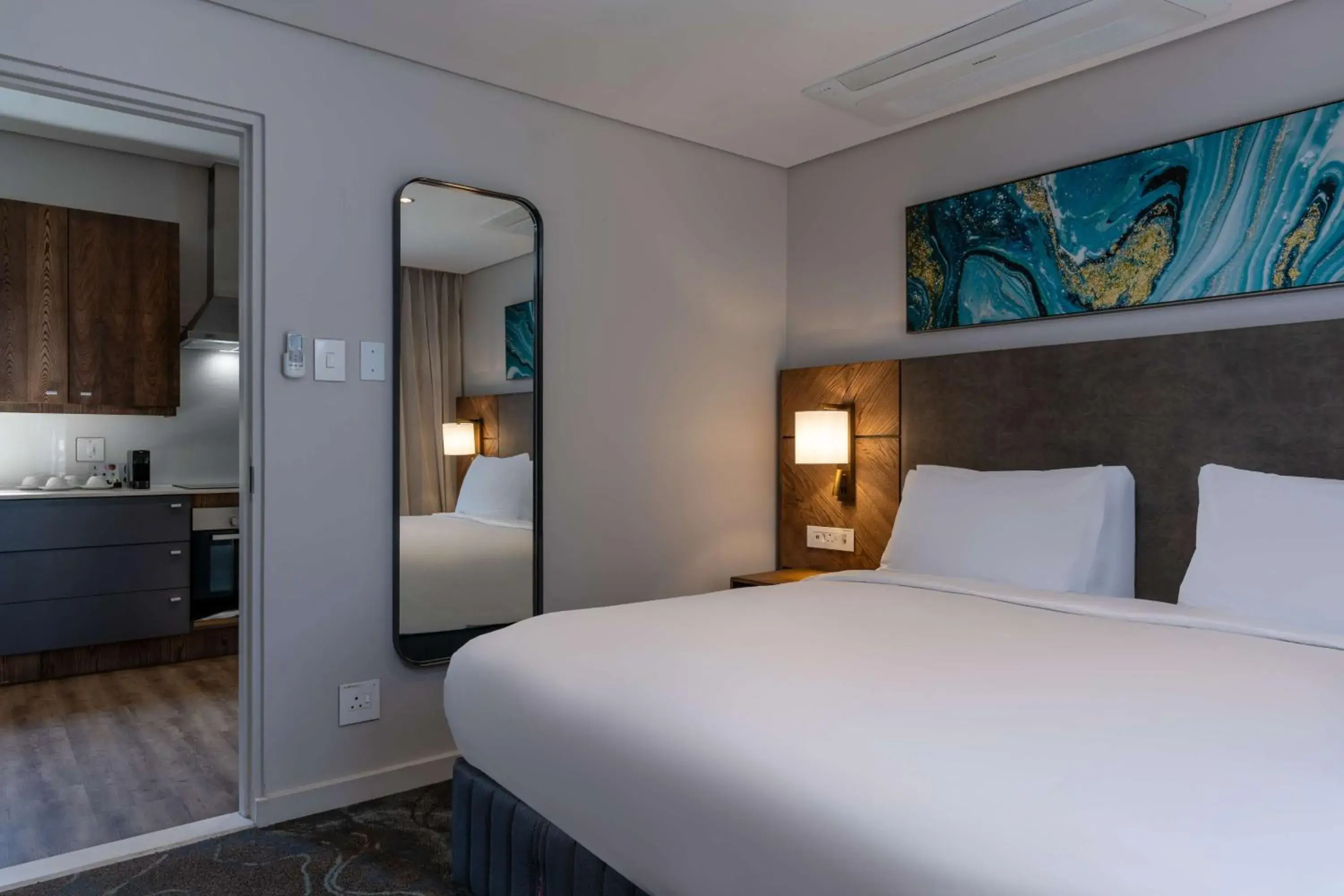 Photo of the whole room, Bed in Radisson Hotel and Convention Centre OR Tambo Airport Photo of the whole room, Bed in Radisson Hotel and Convention Centre OR Tambo Airport