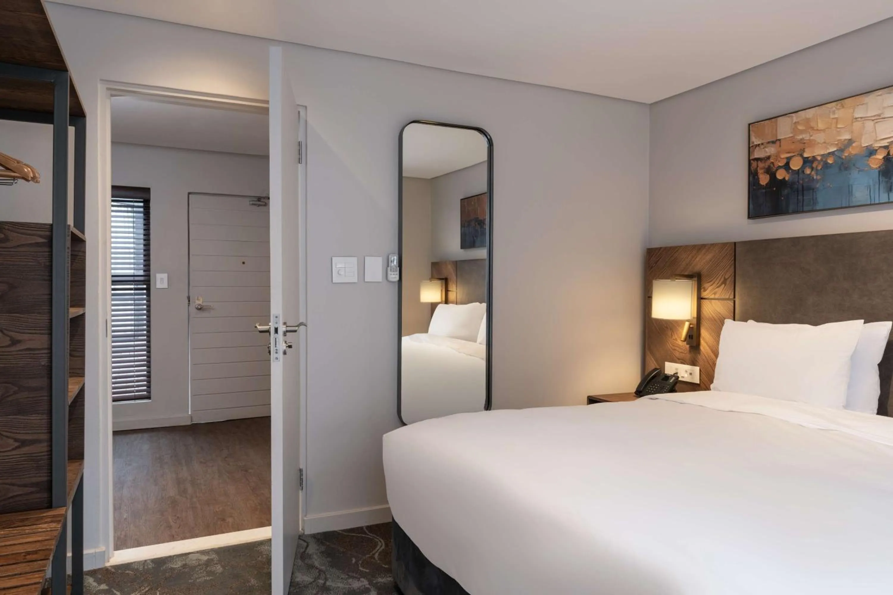 Photo of the whole room, Bed in Radisson Hotel and Convention Centre OR Tambo Airport