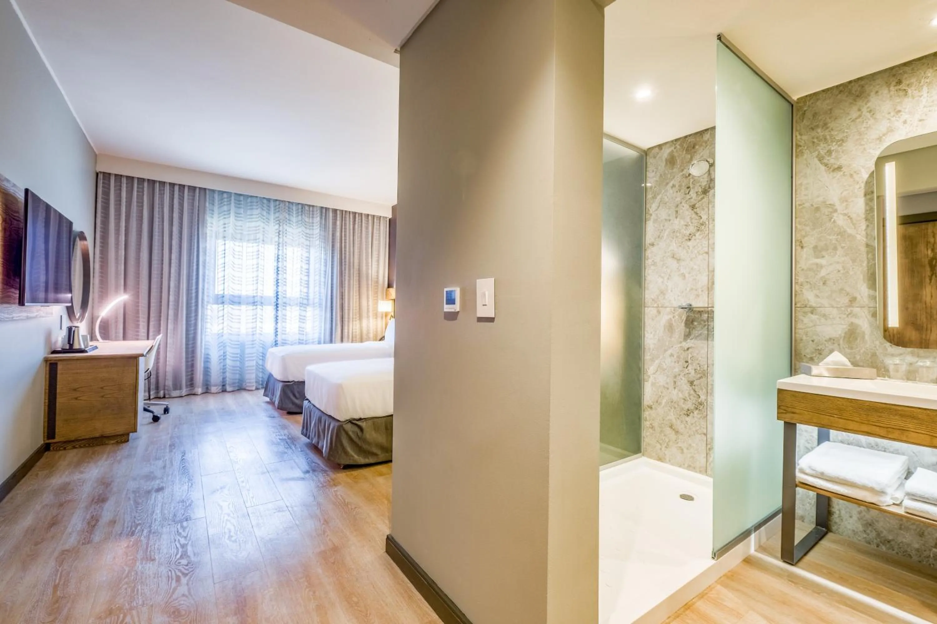 Shower, Bed in Radisson Hotel and Convention Centre OR Tambo Airport