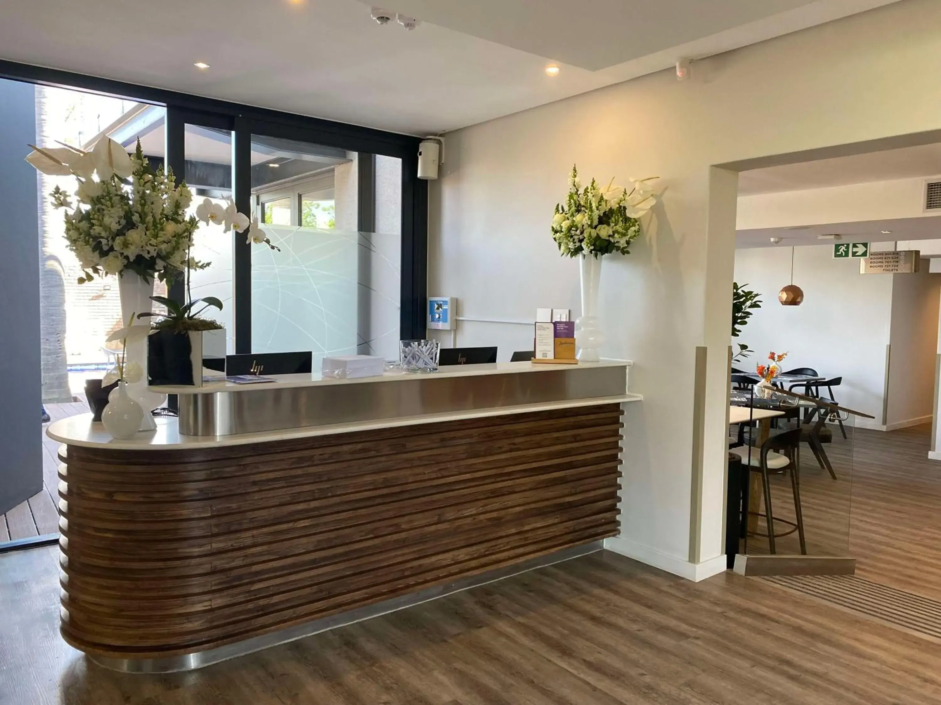 Lobby or reception in Radisson Hotel and Convention Centre OR Tambo Airport Lobby or reception in Radisson Hotel and Convention Centre OR Tambo Airport