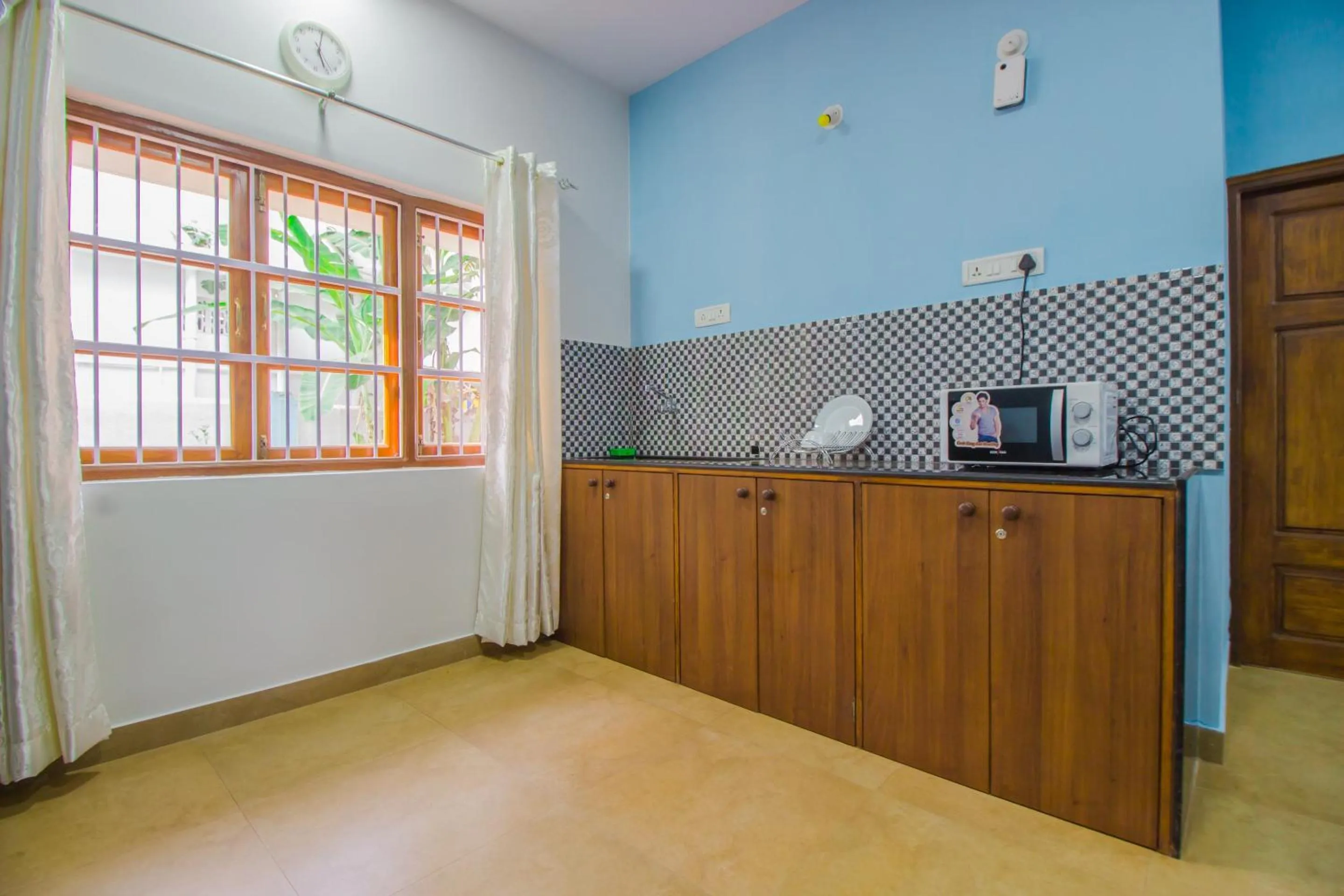 Kitchen or kitchenette in Super Collection O Holy Cross Home Stays