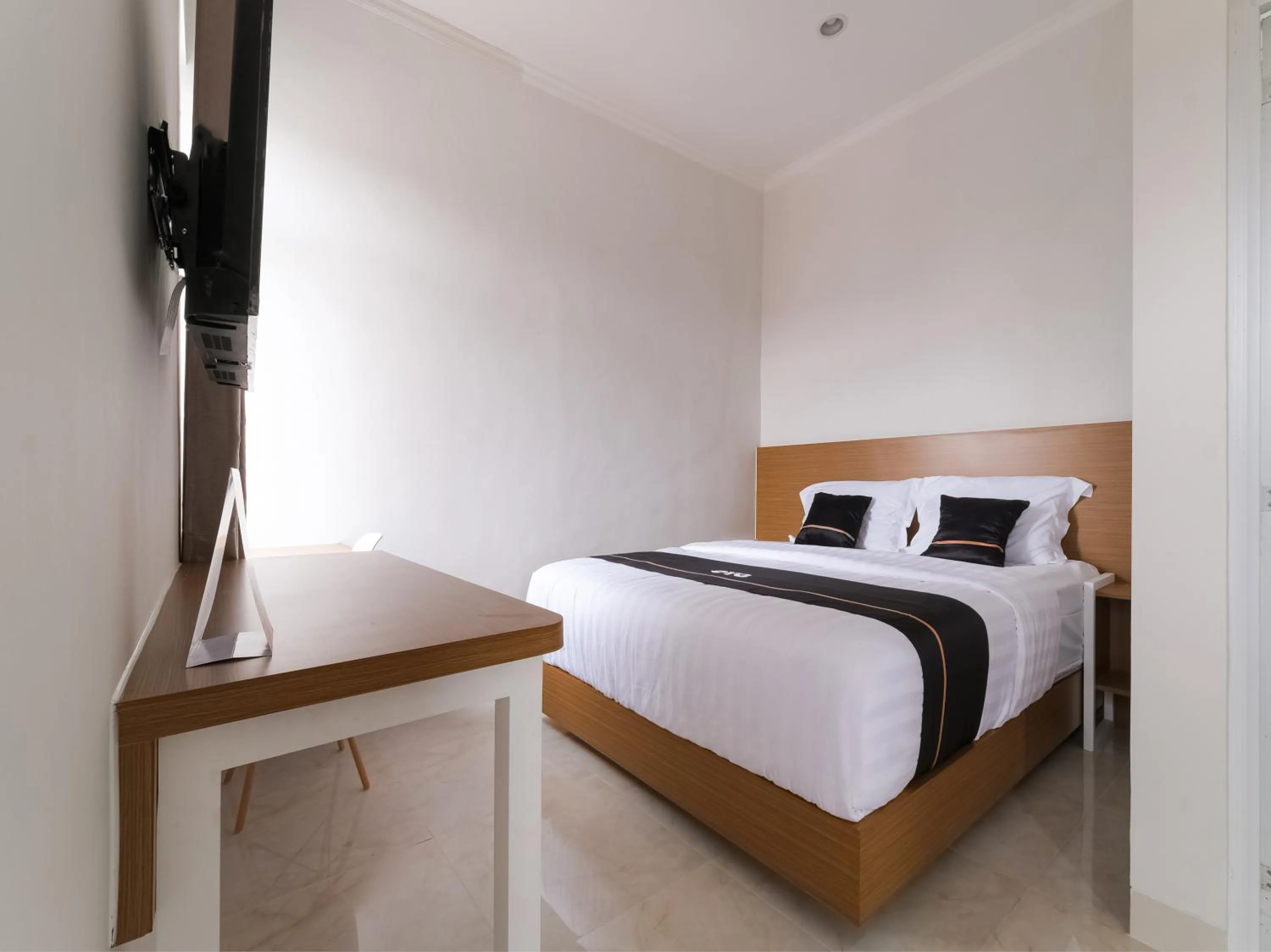 Bedroom in Super OYO Collection O 90023 Damar Kusumo Guest House