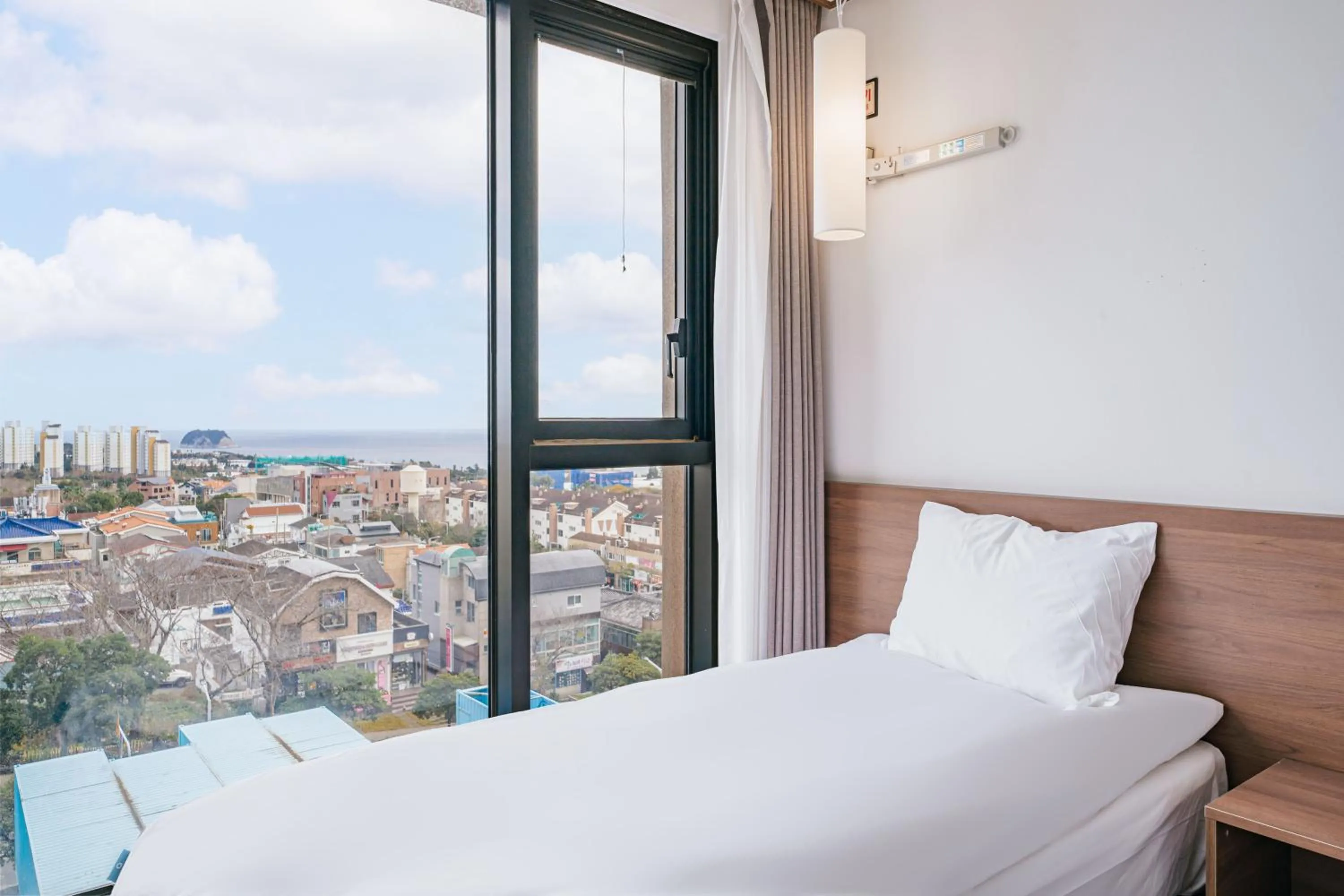 View (from property/room), Bed in Tamara Jeju hotel
