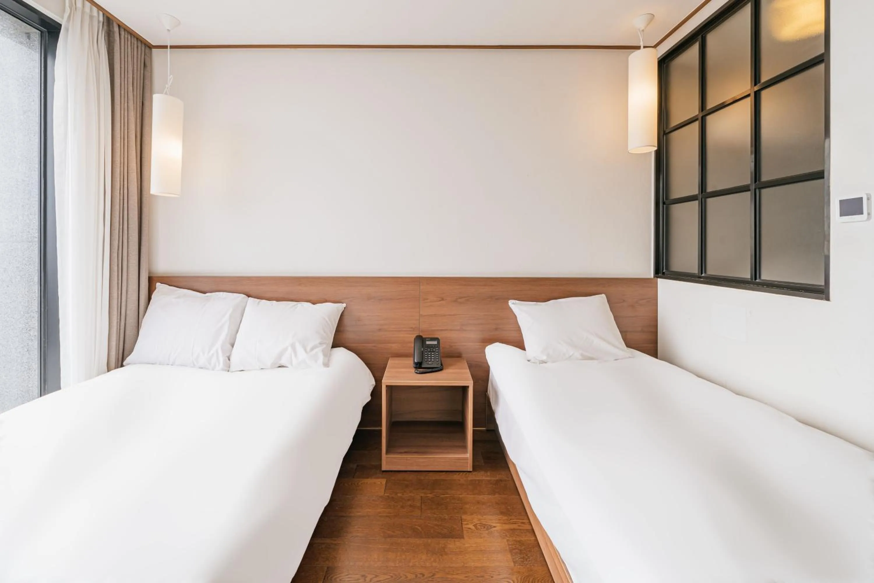 Bed in Tamara Jeju hotel