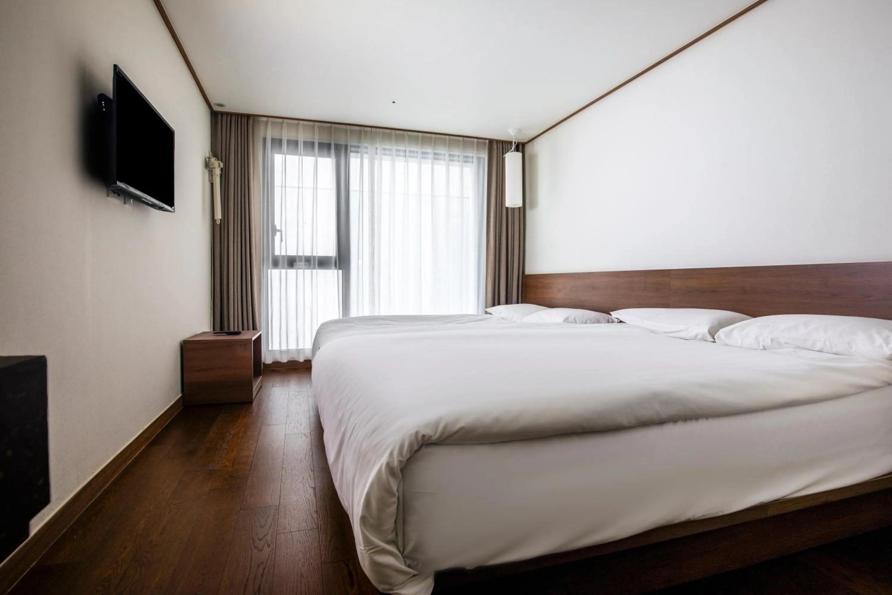Area and facilities, Bed in Tamara Jeju hotel