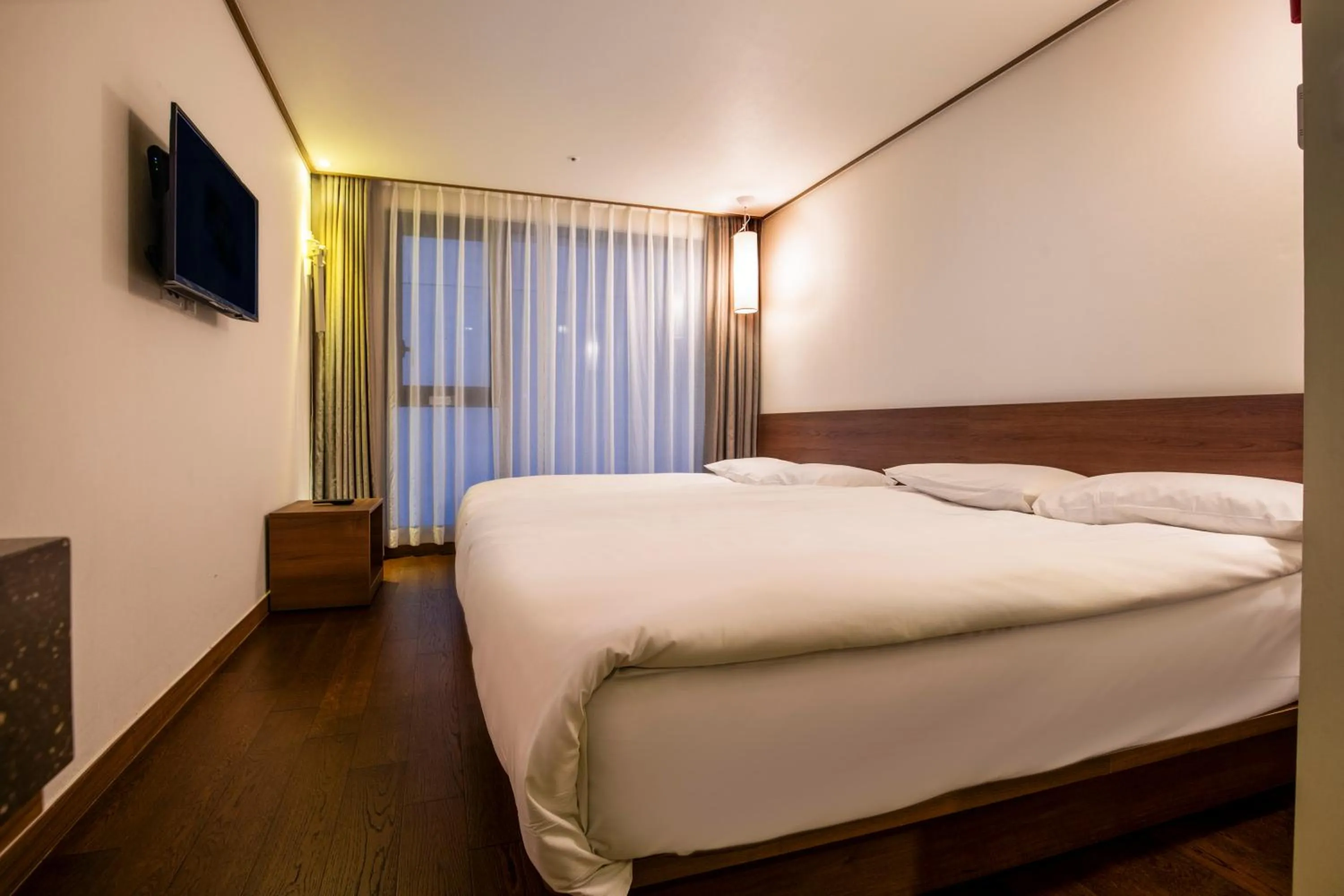 Area and facilities, Bed in Tamara Jeju hotel