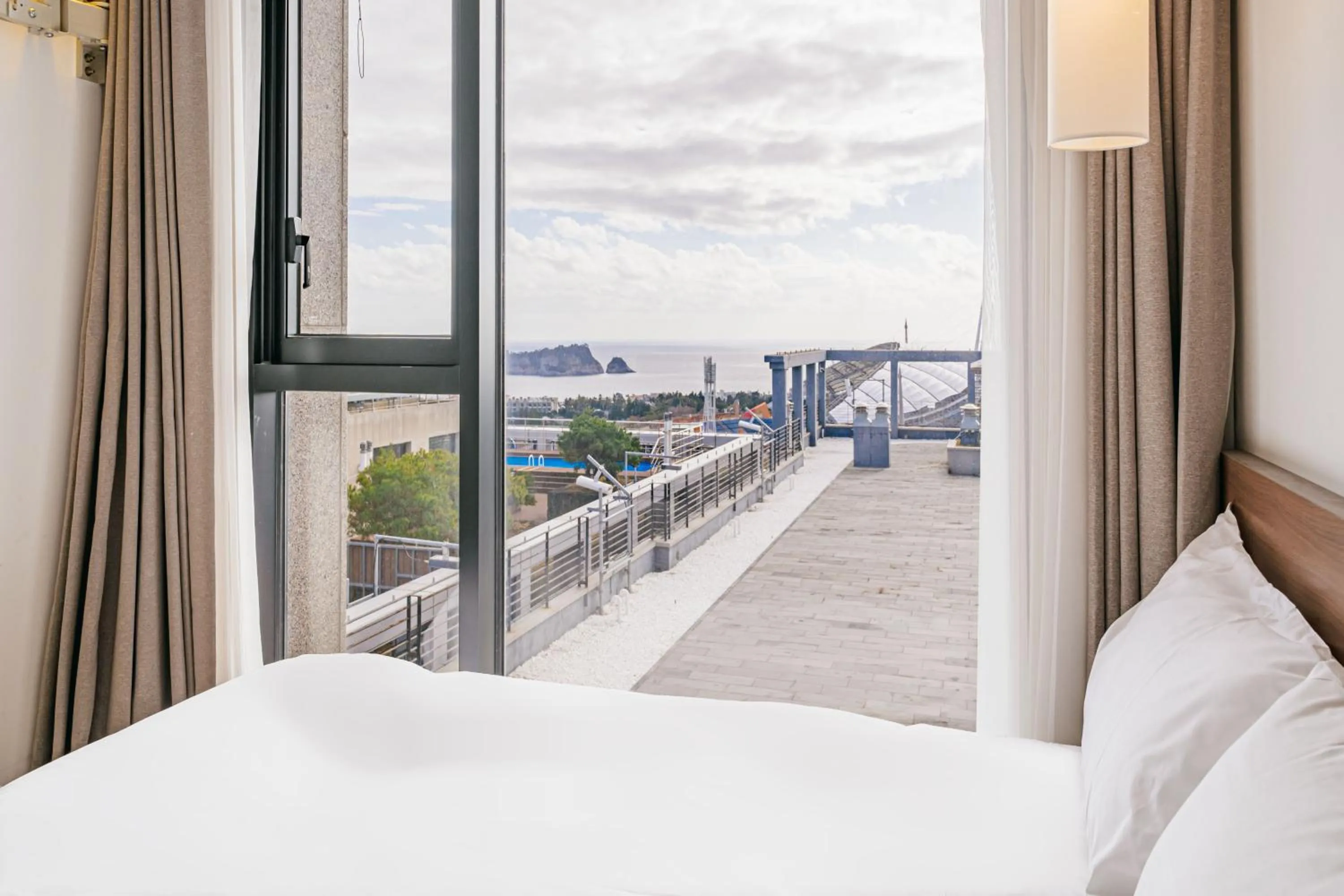 View (from property/room), Bed in Tamara Jeju hotel