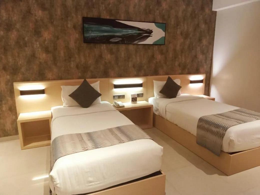 Bed in Click Hotel Bangalore - International Airport