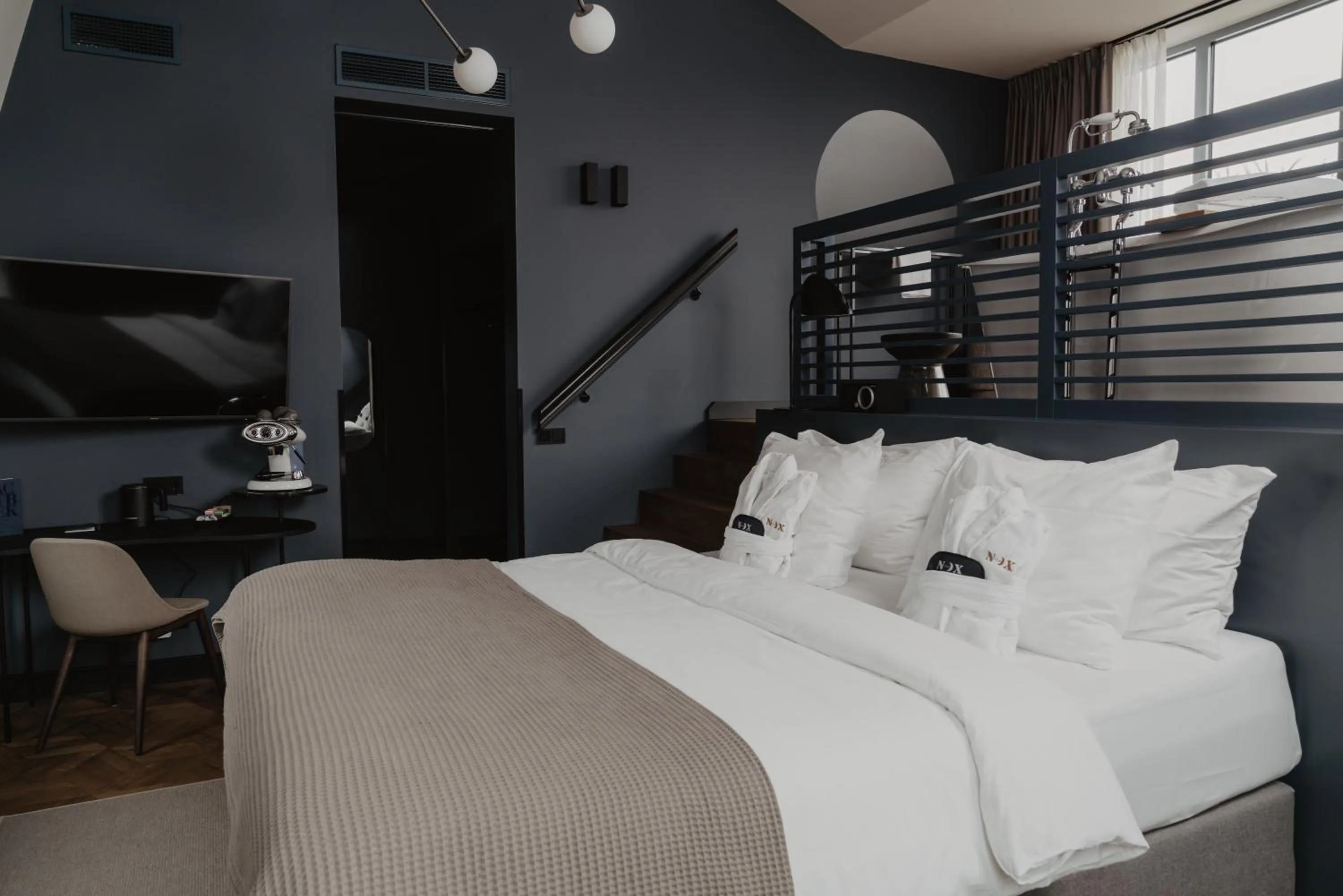 Bed in The Nox Hotel