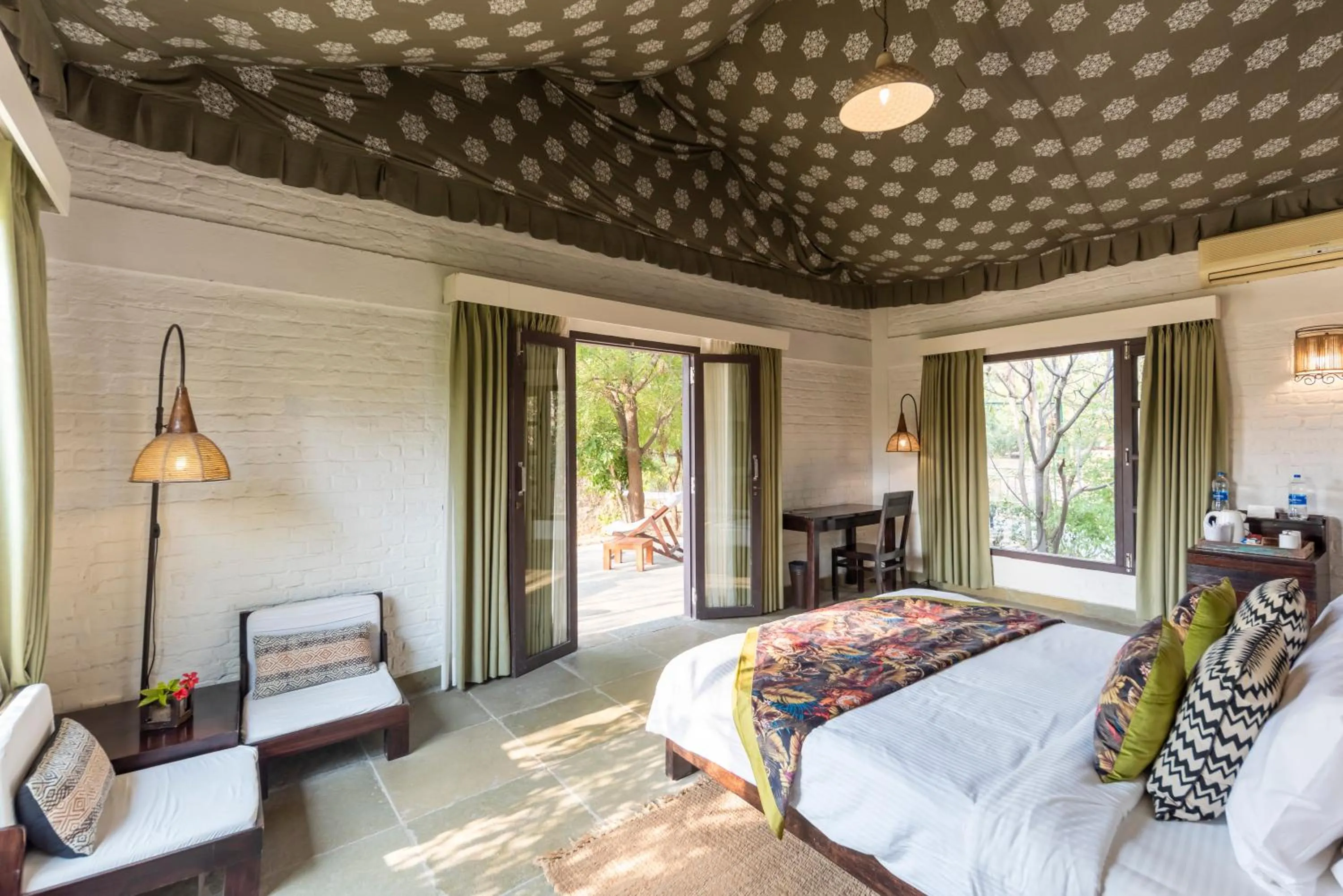 Bed in Vanaashrya Resort and Spa Sariska