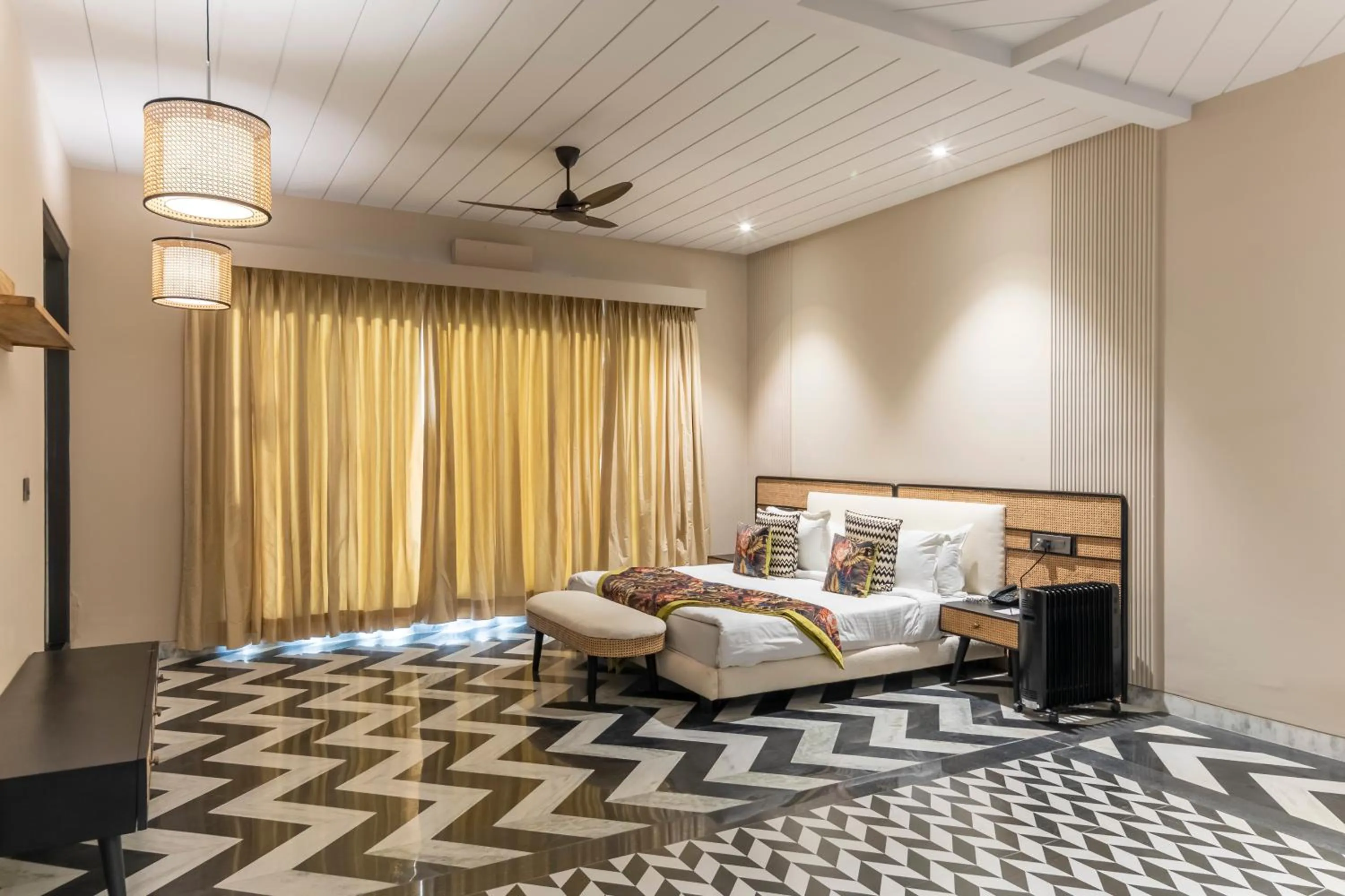 Bed in Vanaashrya Resort and Spa Sariska