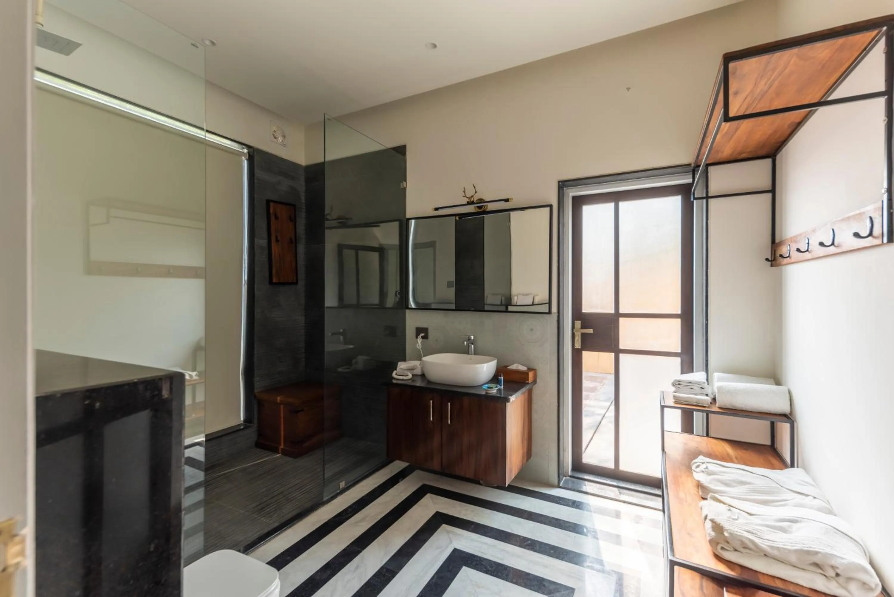 Shower in Vanaashrya Resort and Spa Sariska