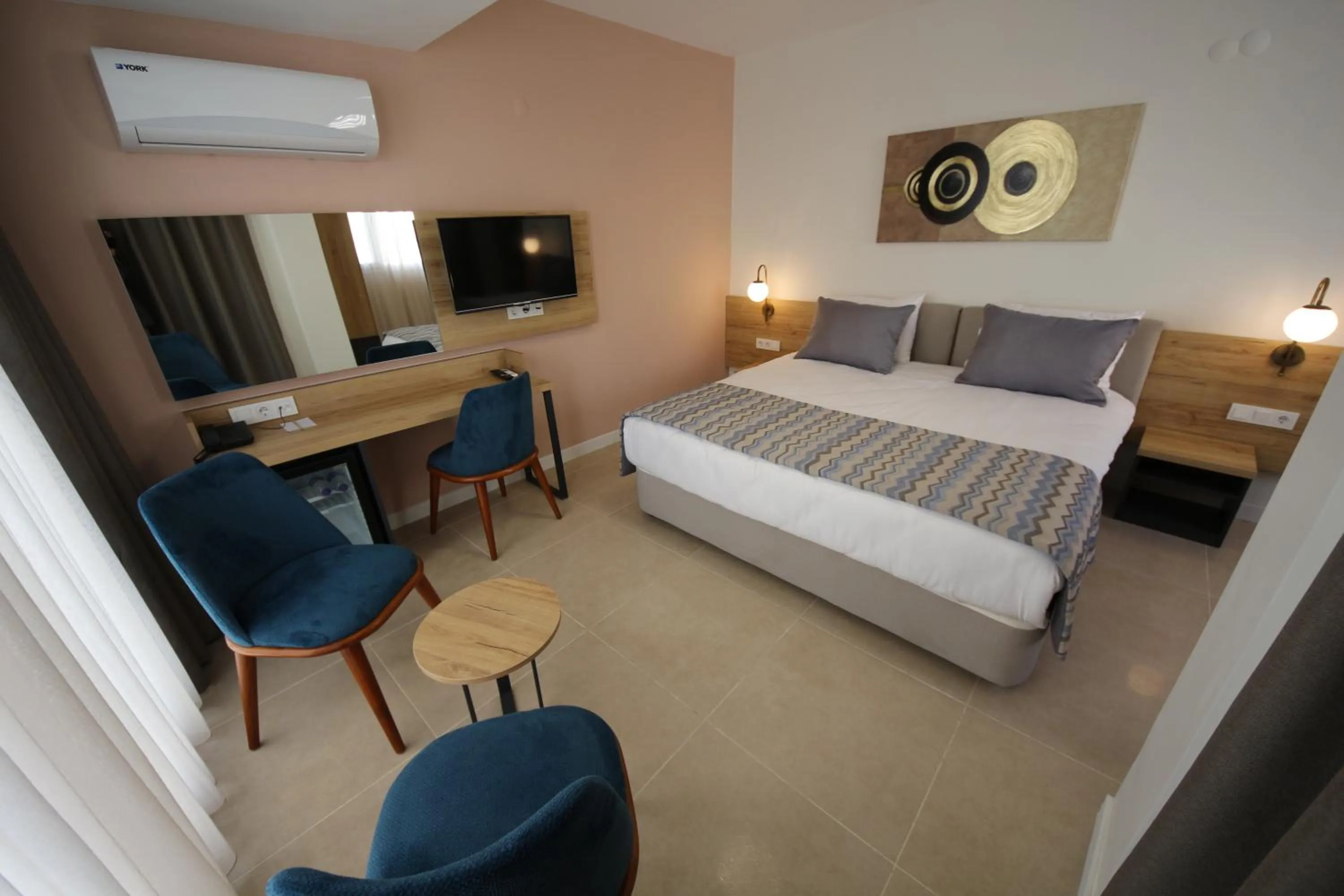 Bed in SPİLOS GÜMÜLDÜR HOTEL