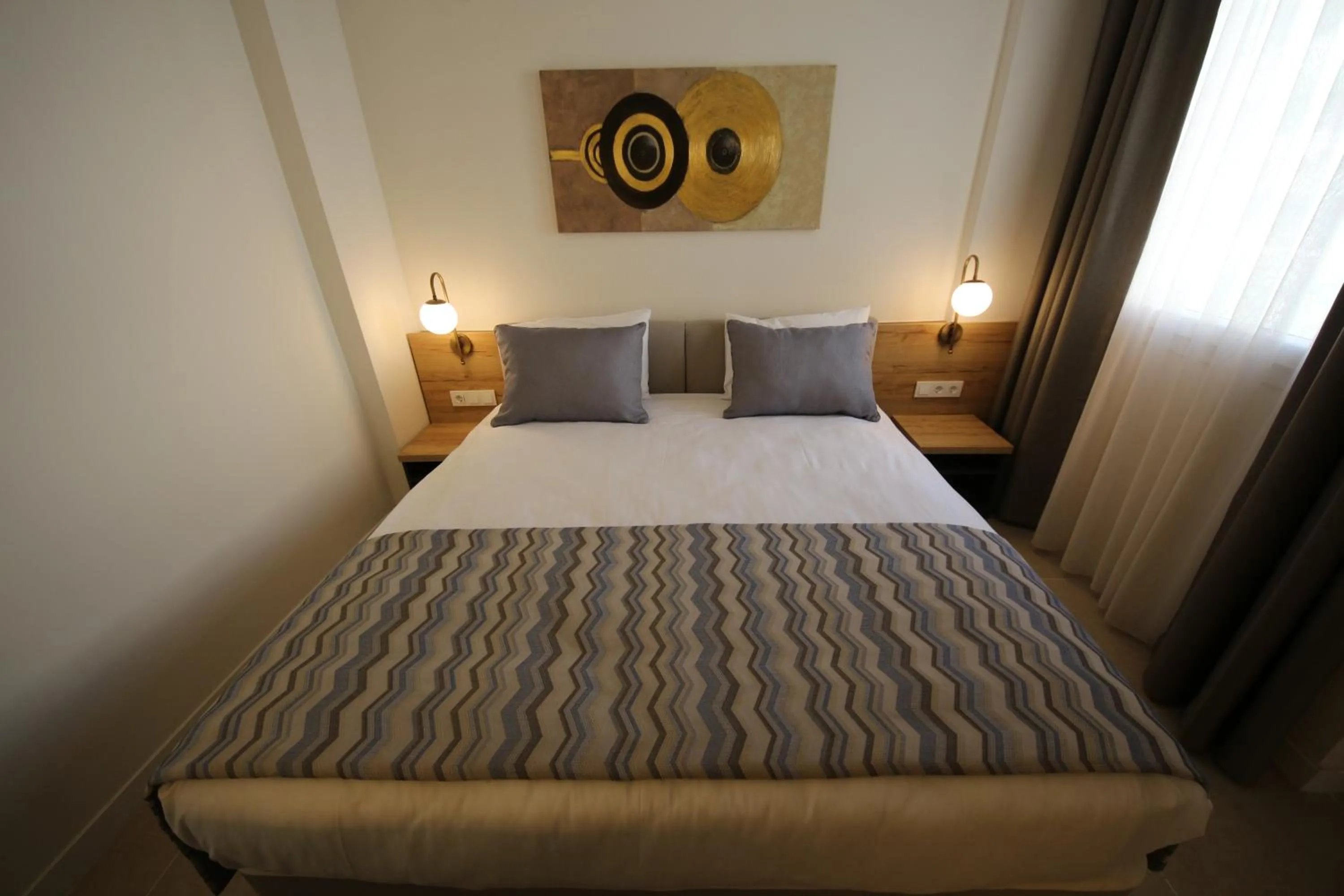 Bed in SPİLOS GÜMÜLDÜR HOTEL