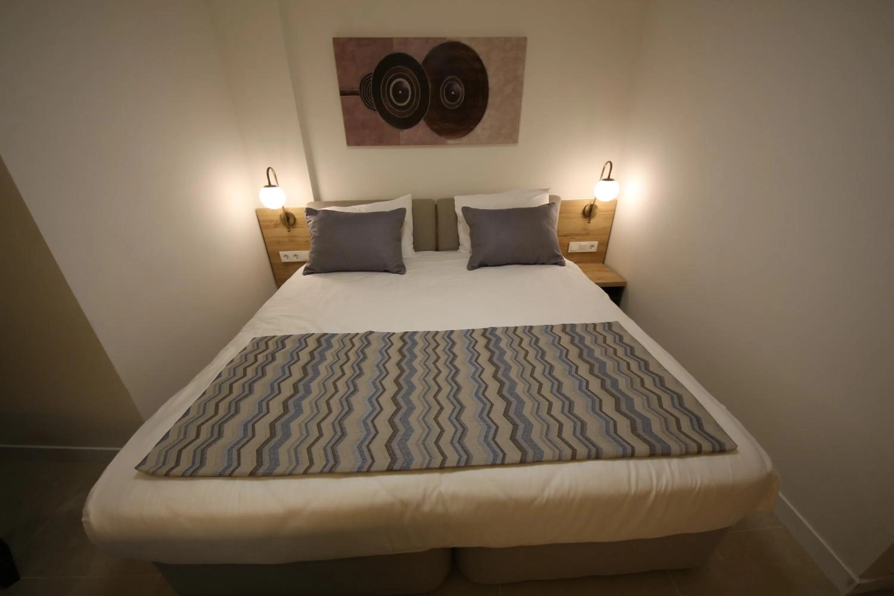 Bed in SPİLOS GÜMÜLDÜR HOTEL