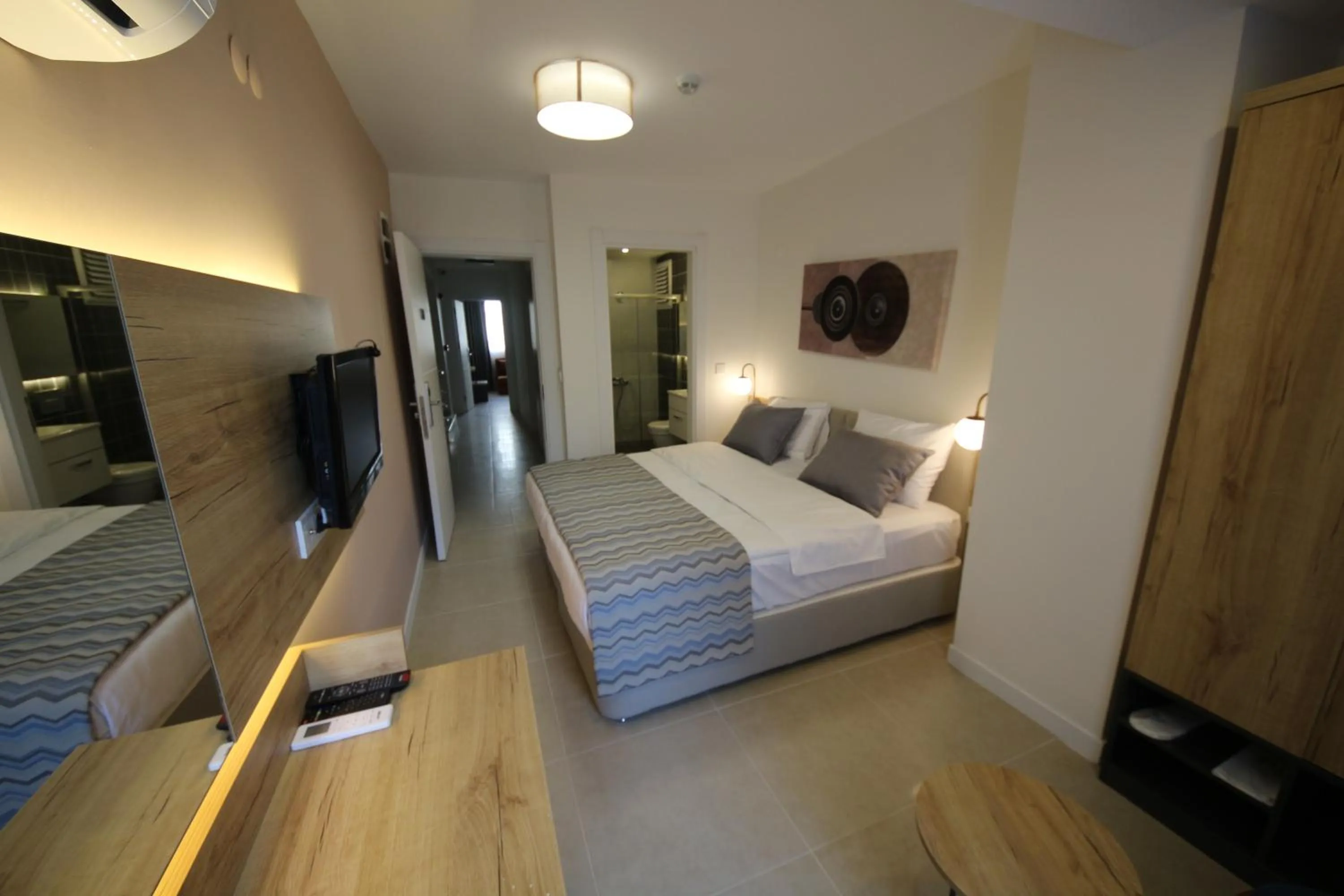 Bed in SPİLOS GÜMÜLDÜR HOTEL