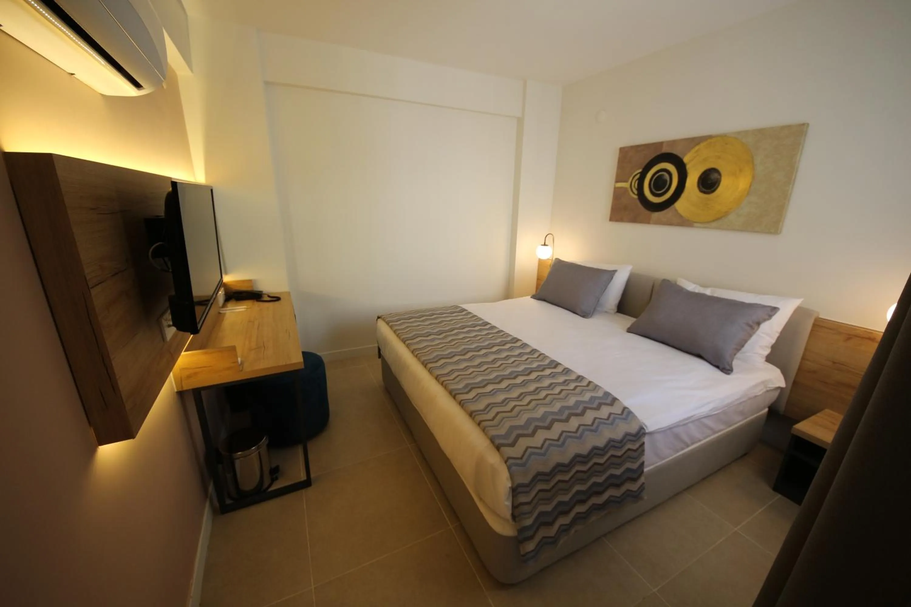 Bed in SPİLOS GÜMÜLDÜR HOTEL