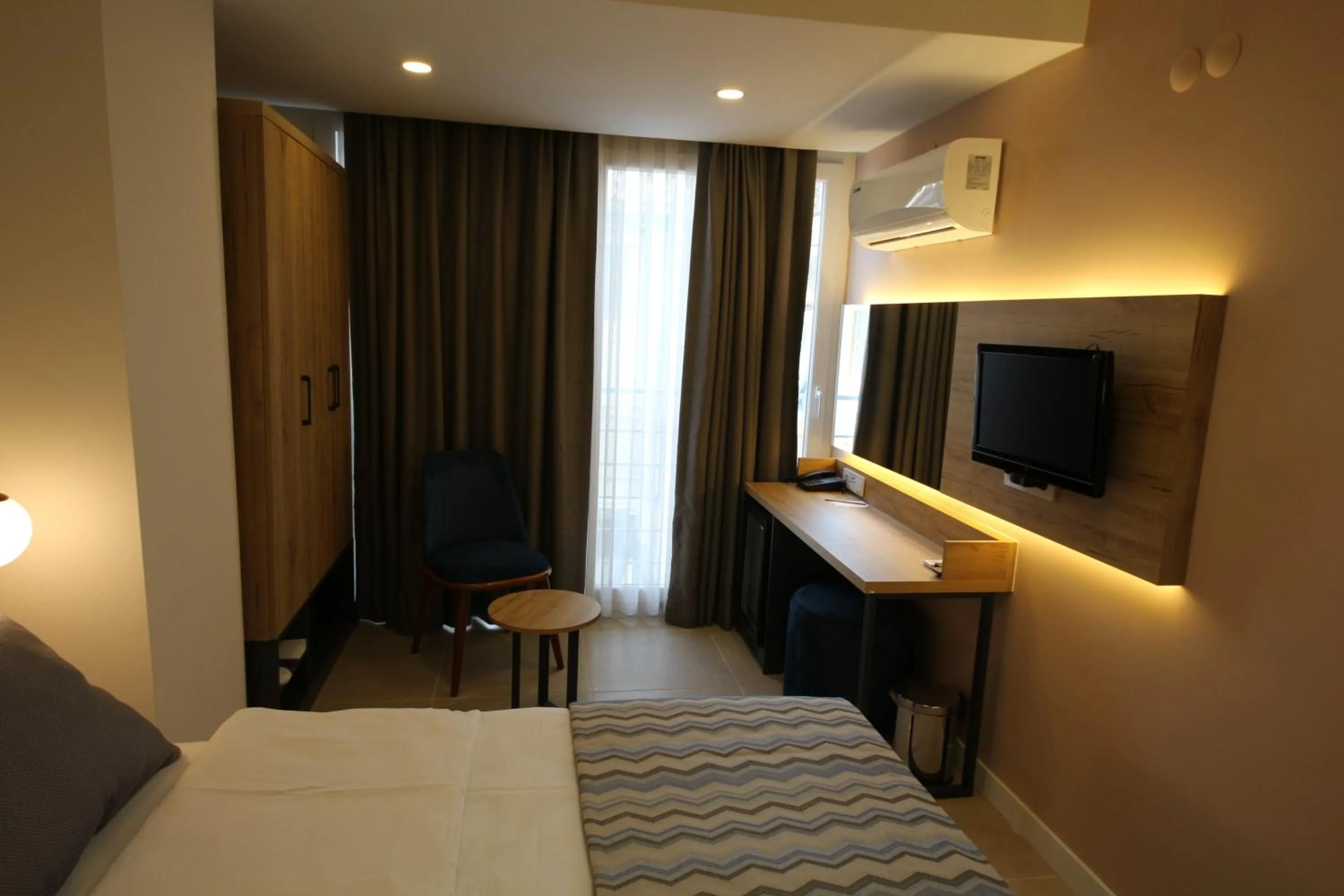 Bed in SPİLOS GÜMÜLDÜR HOTEL