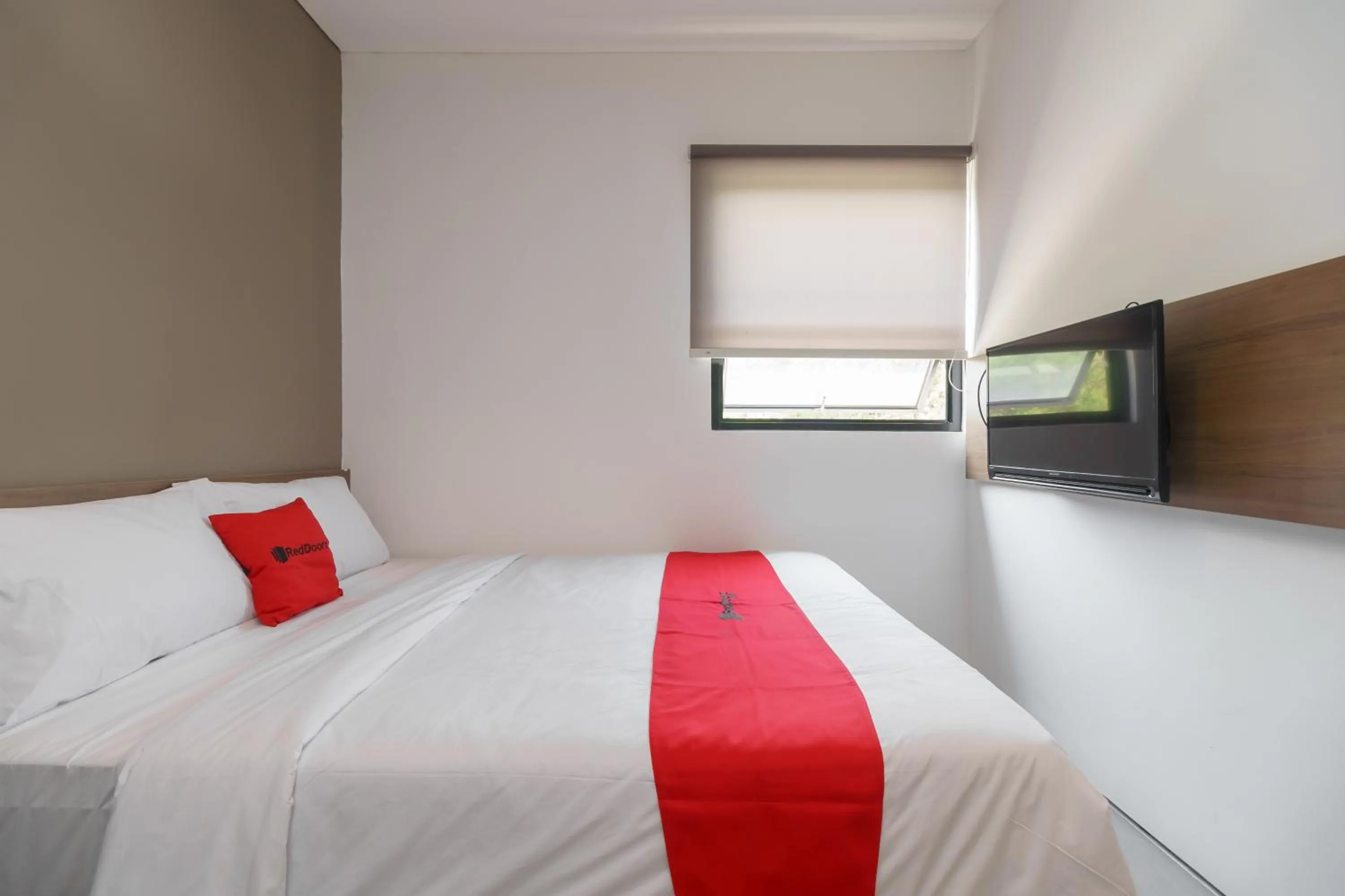 Bed in RedDoorz Syariah near Rumah Sakit Medika Dramaga