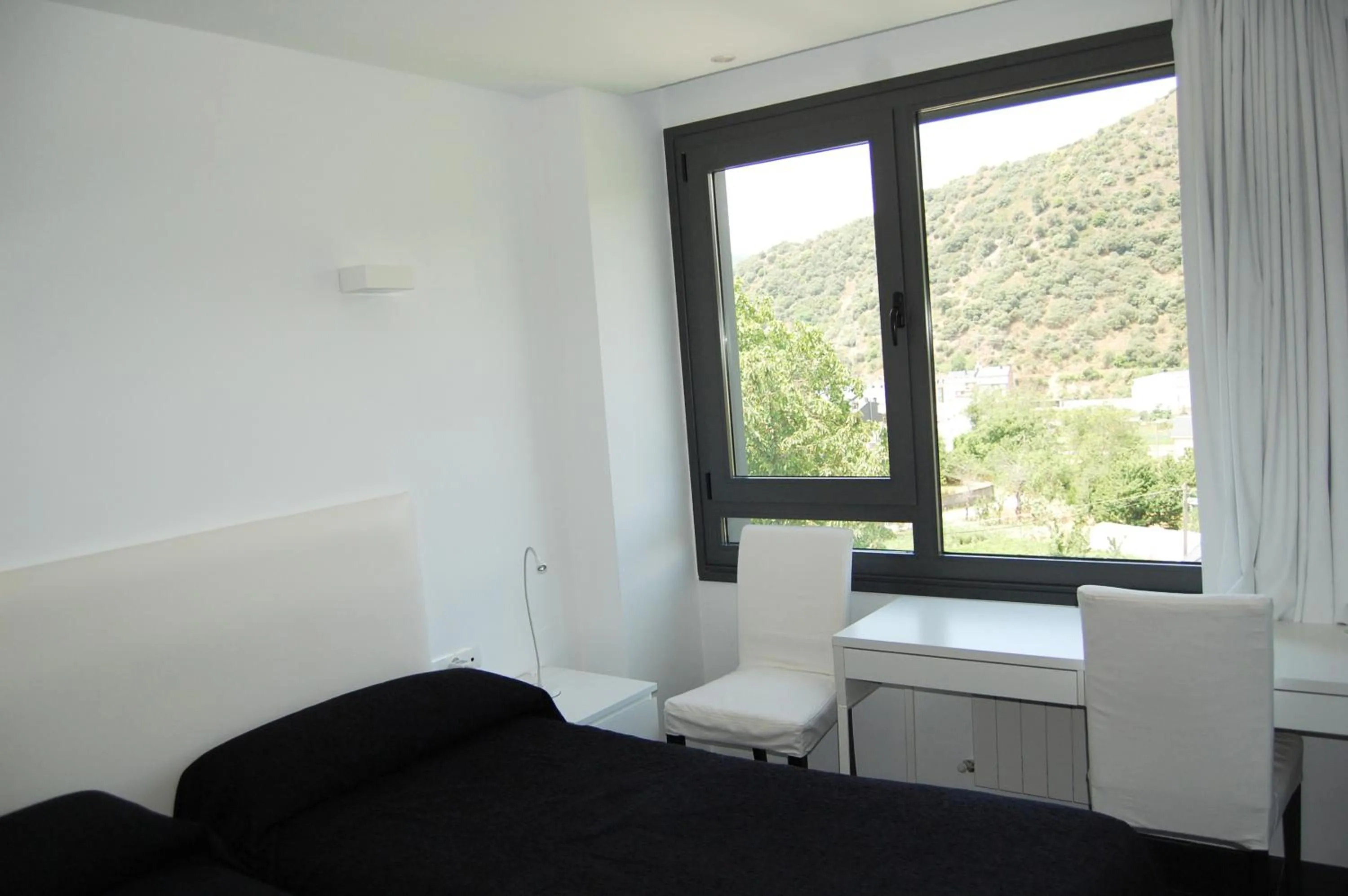 Bedroom in Hostal Tres Campanas