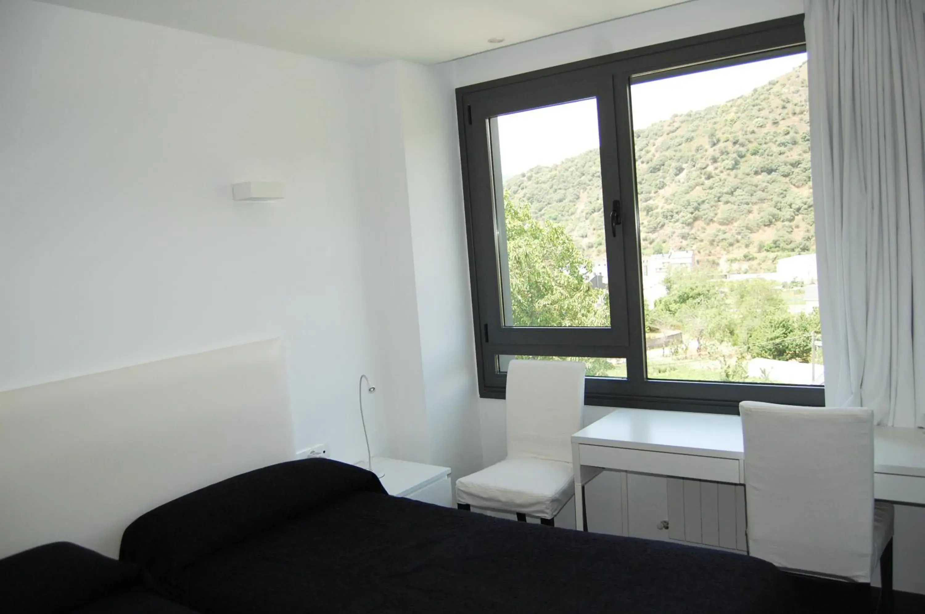 Twin Room in Hostal Tres Campanas Twin Room in Hostal Tres Campanas