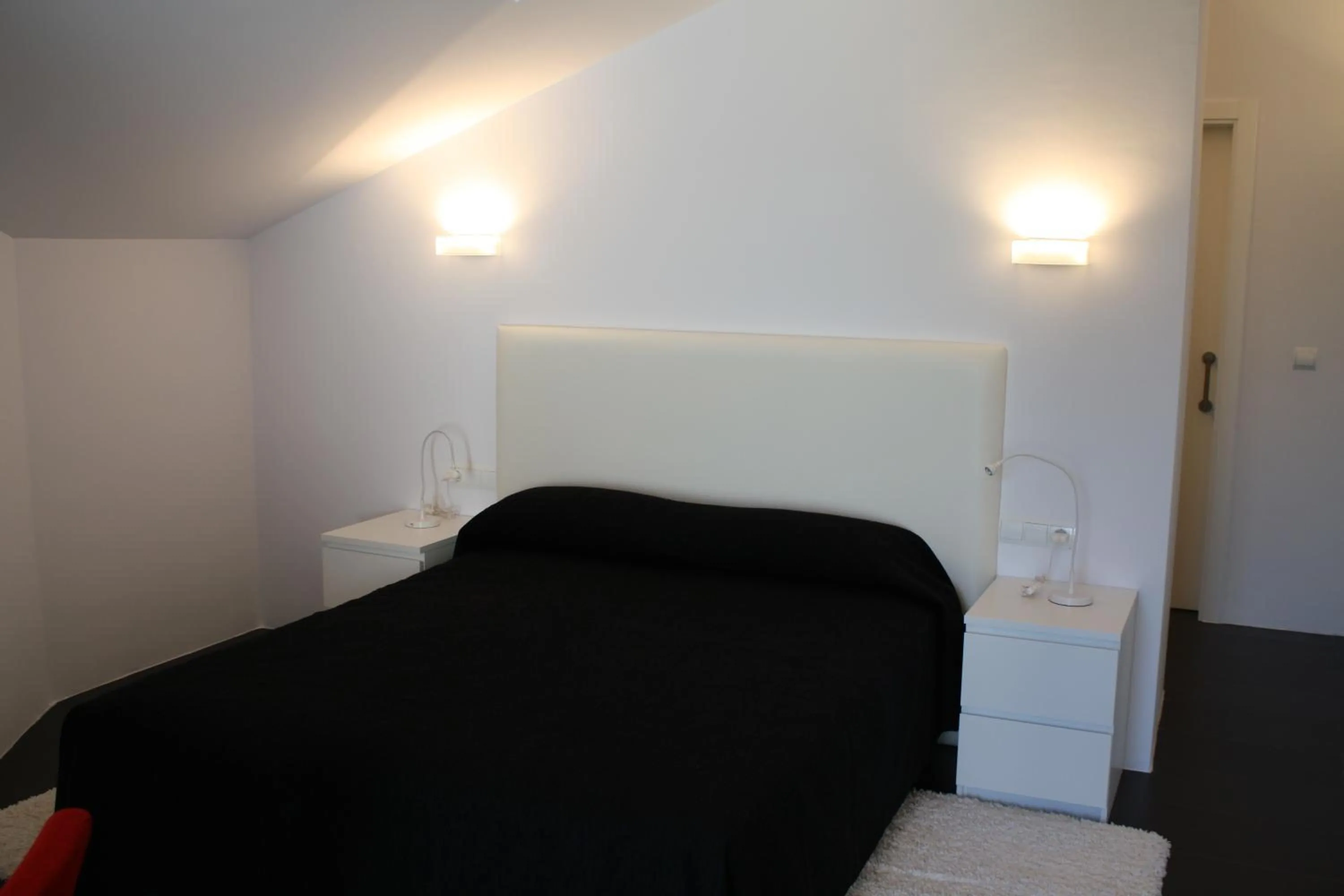 Bed in Hostal Tres Campanas