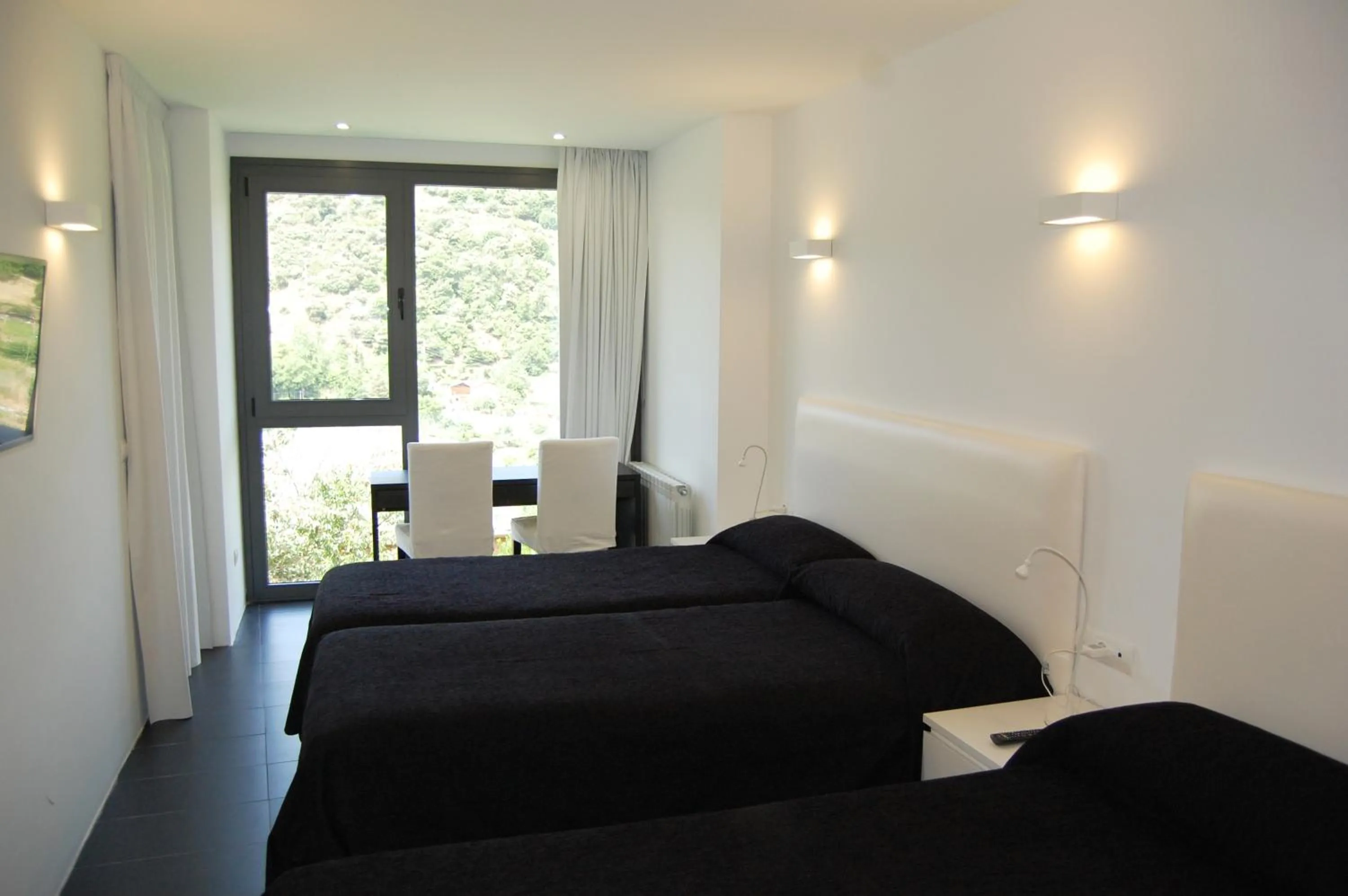 Bed in Hostal Tres Campanas