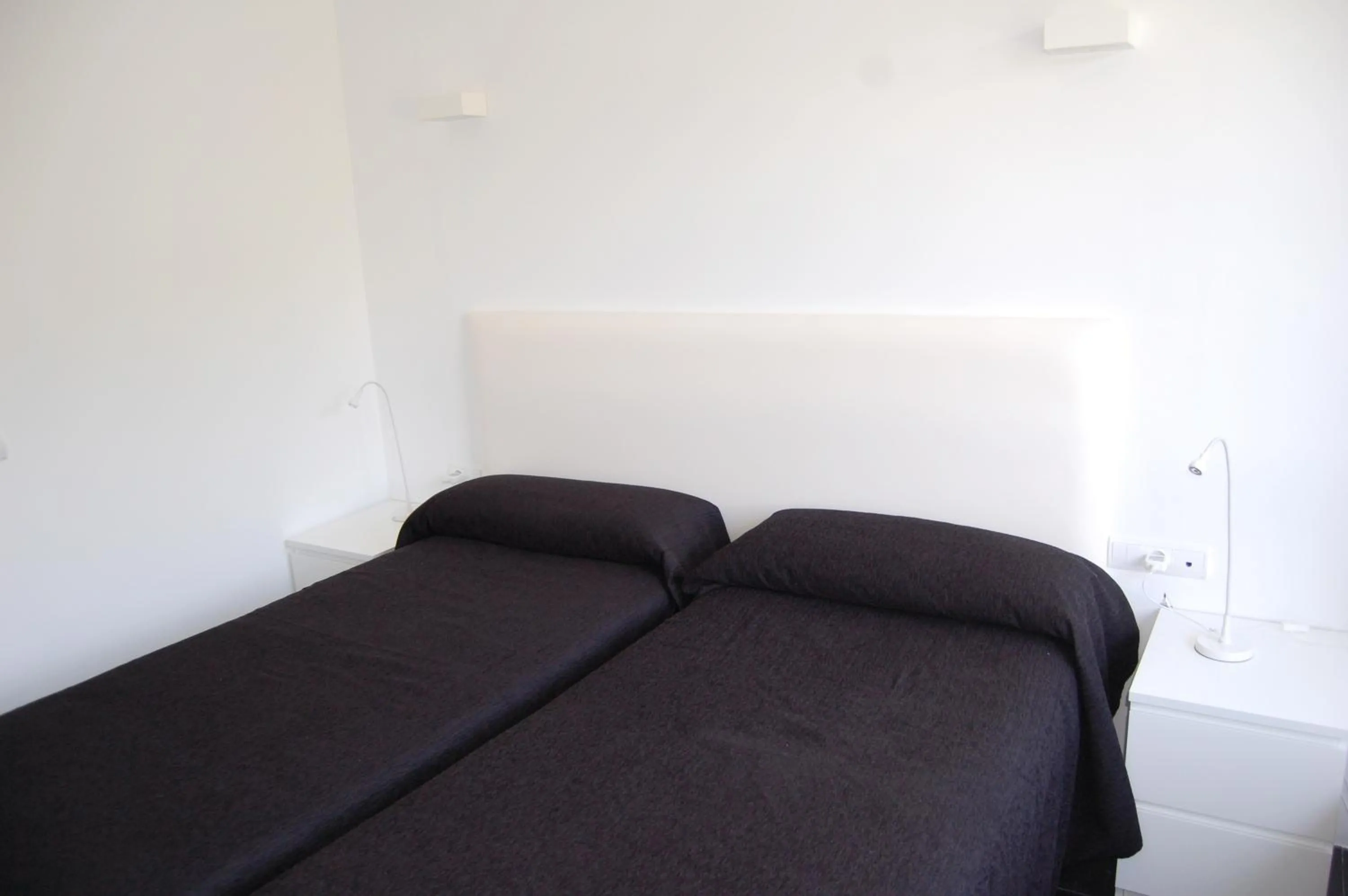 Bed in Hostal Tres Campanas