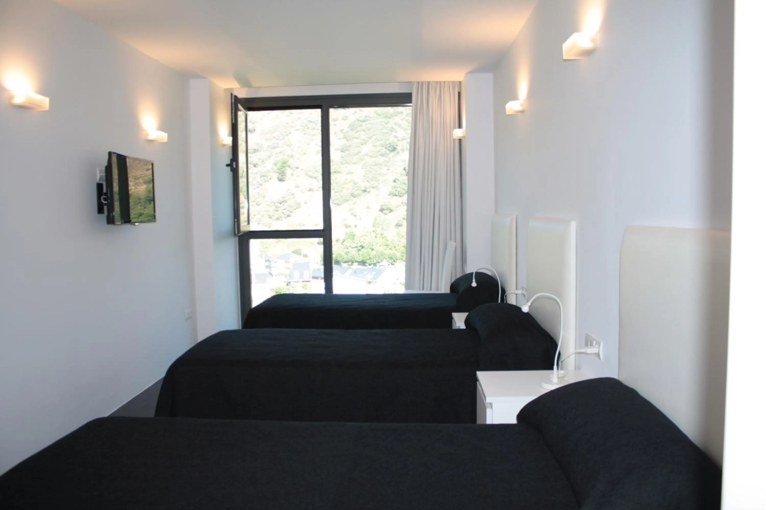 Bed in Hostal Tres Campanas