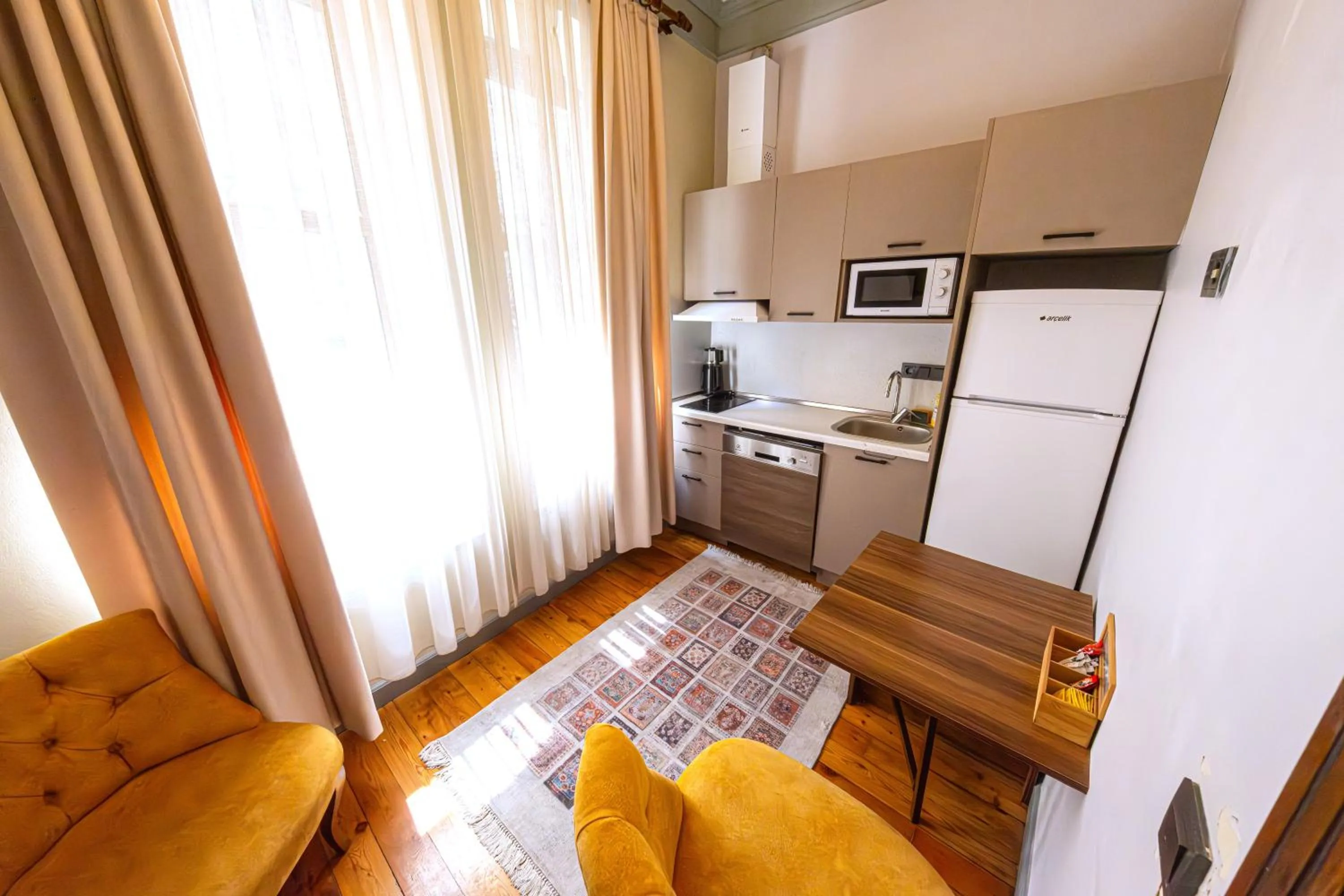 Kitchen or kitchenette in O'Pera Okanlı Suites