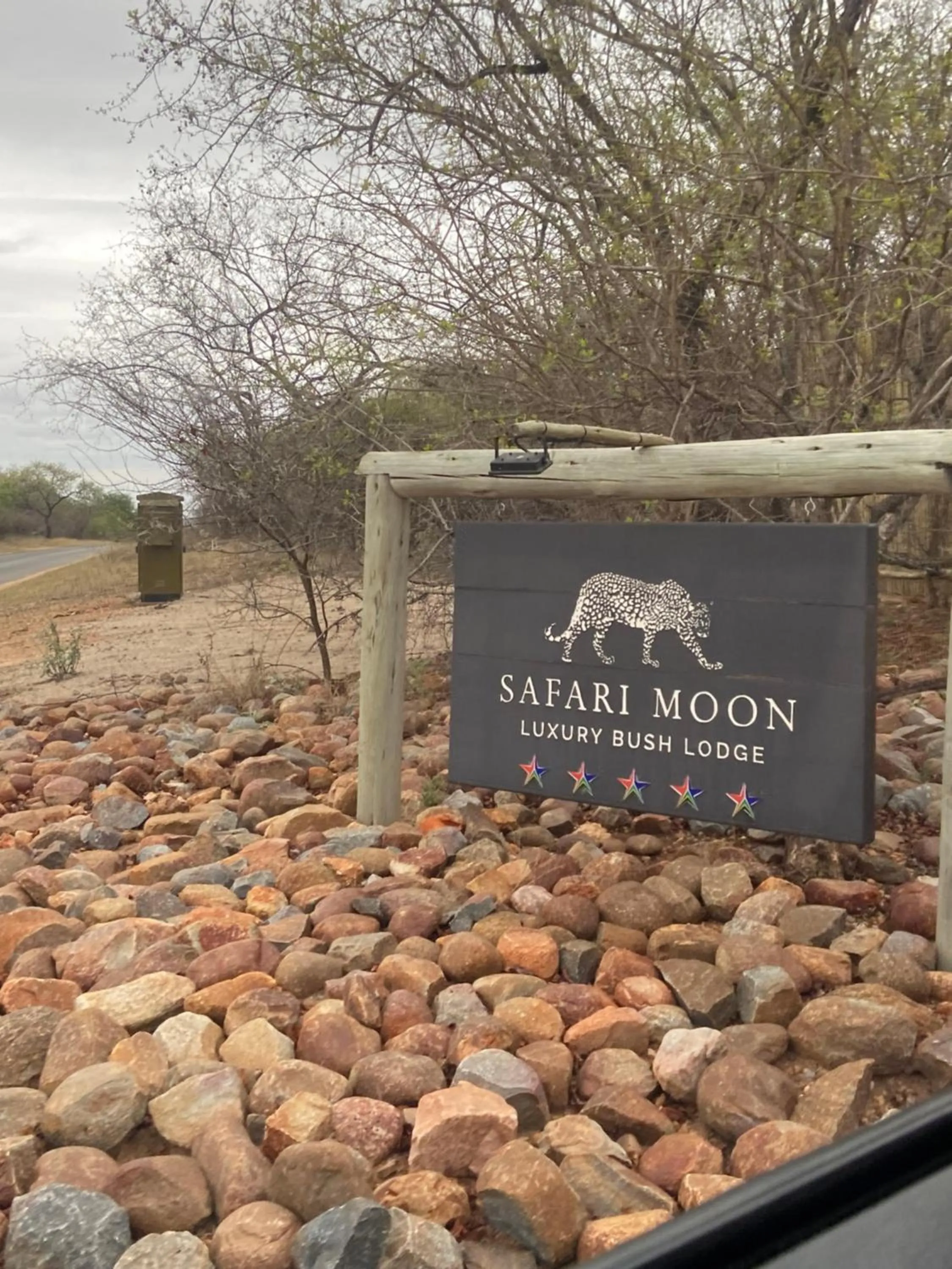 Property logo or sign in Safari Moon Luxury Bush Lodge