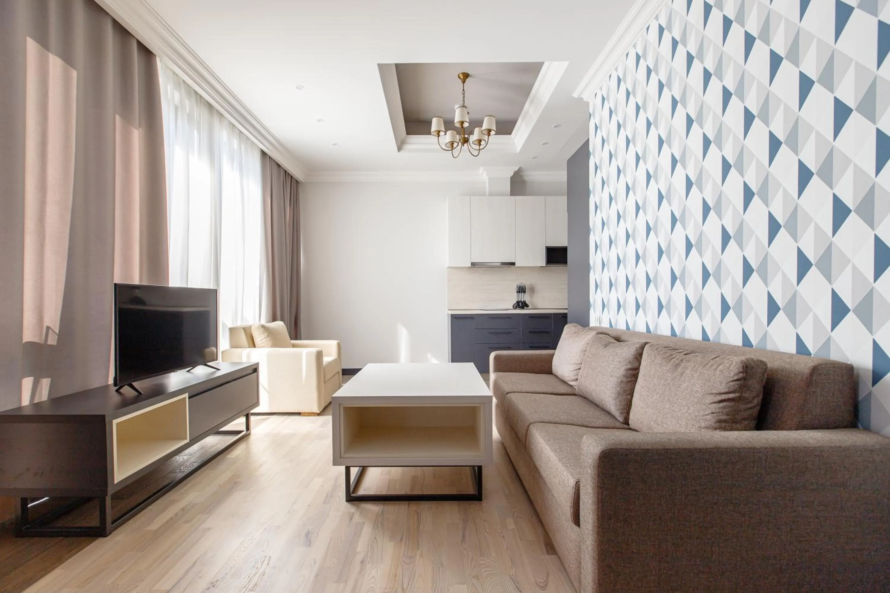 TV and multimedia in Hilltop North Avenue by Stellar Hotels, Yerevan