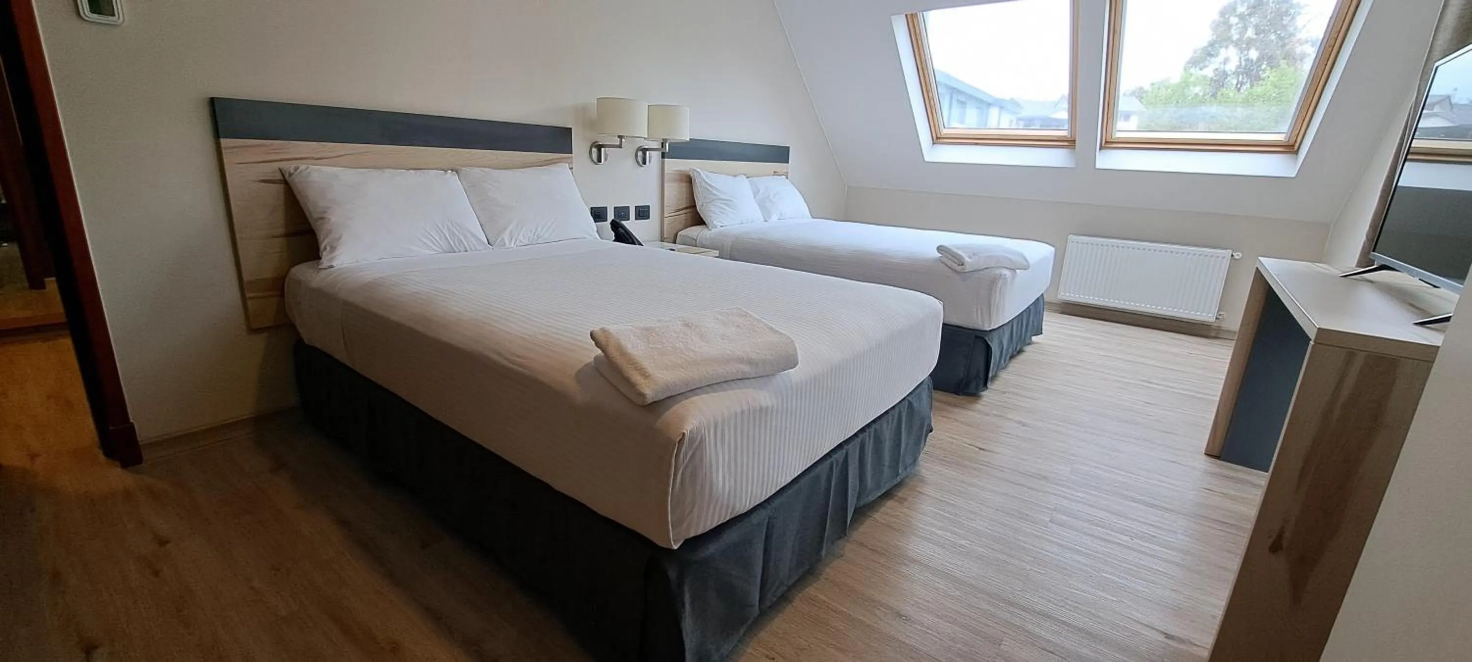 Bed in Hotel Diego de Almagro Castro