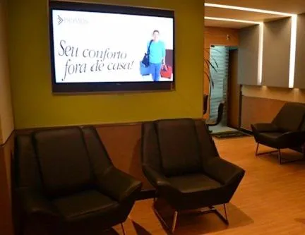 Communal lounge/ TV room in Hotel Domus Itabira