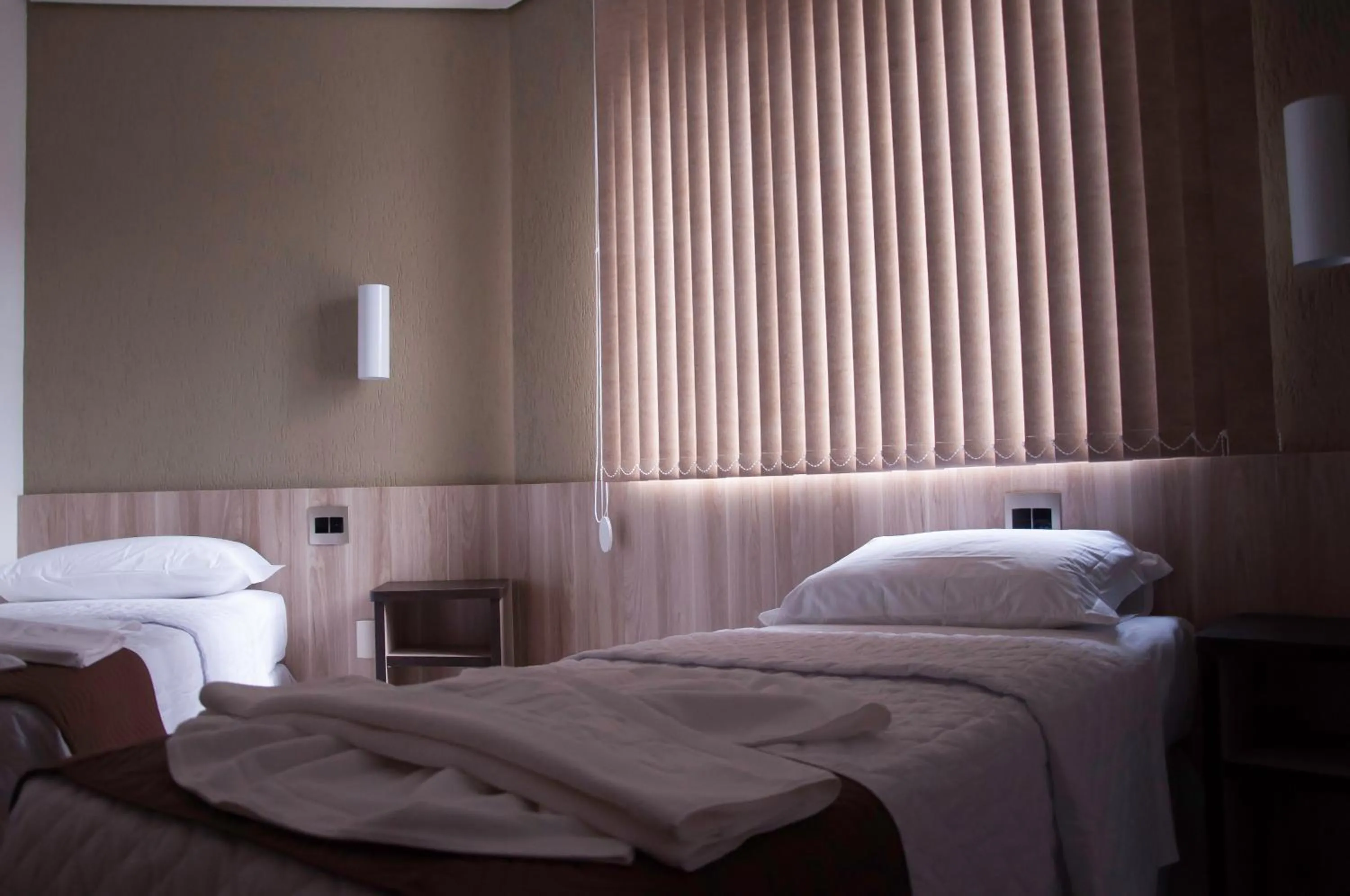 View (from property/room), Bed in Hotel Domus Itabira