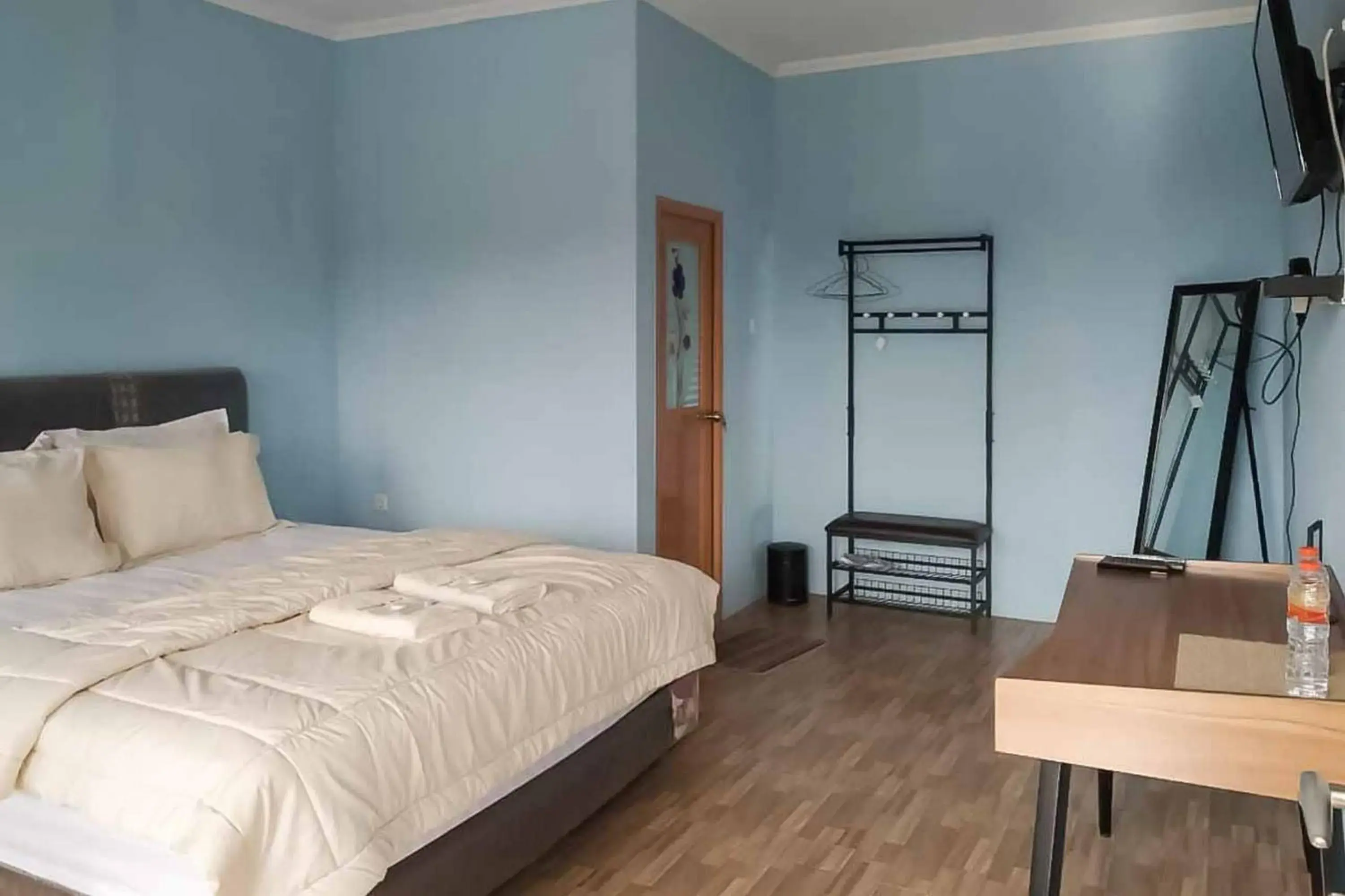 Bed in Kampung Abdi Resort Syariah Mitra RedDoorz Bed in Kampung Abdi Resort Syariah Mitra RedDoorz