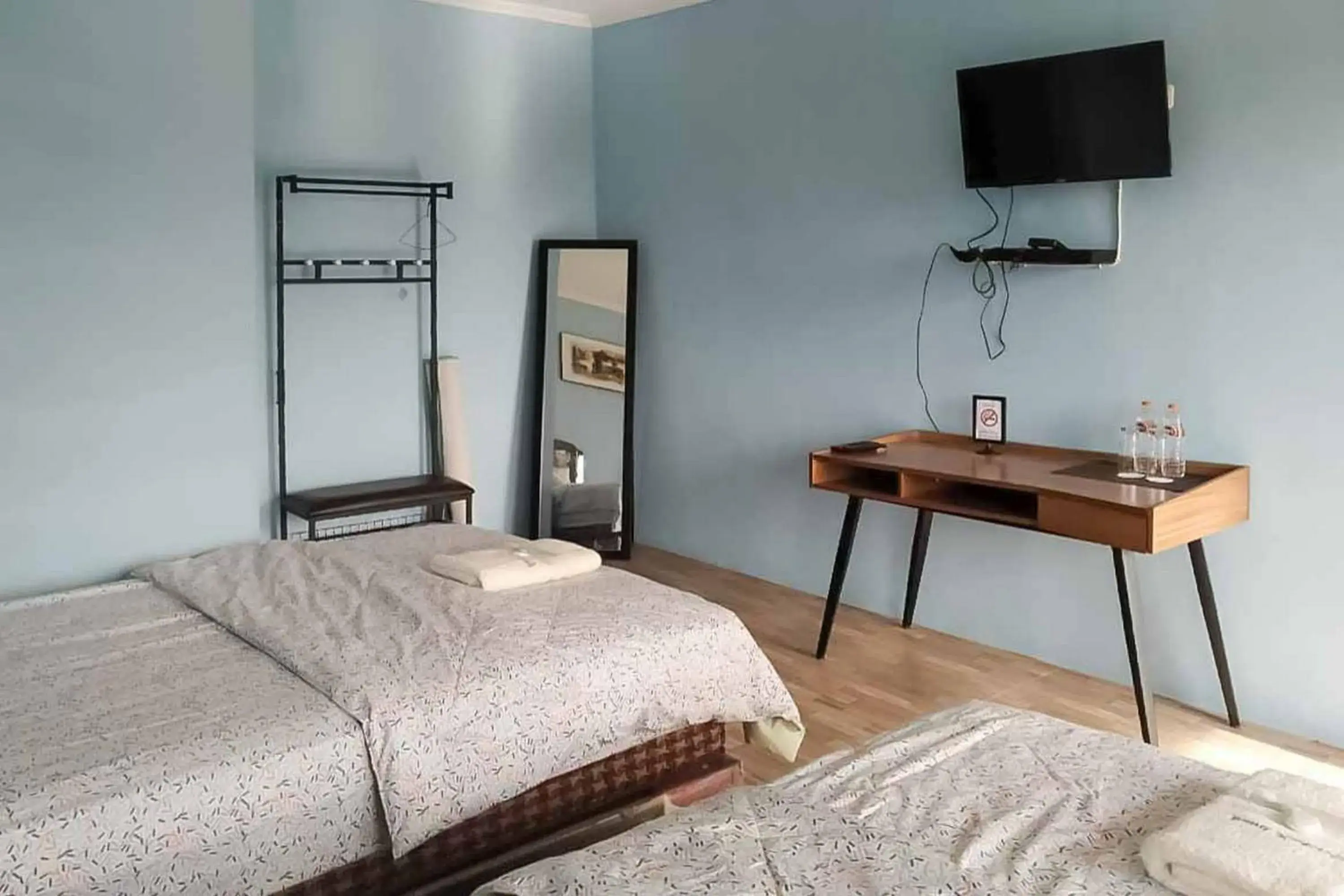 Bed in Kampung Abdi Resort Syariah Mitra RedDoorz Bed in Kampung Abdi Resort Syariah Mitra RedDoorz