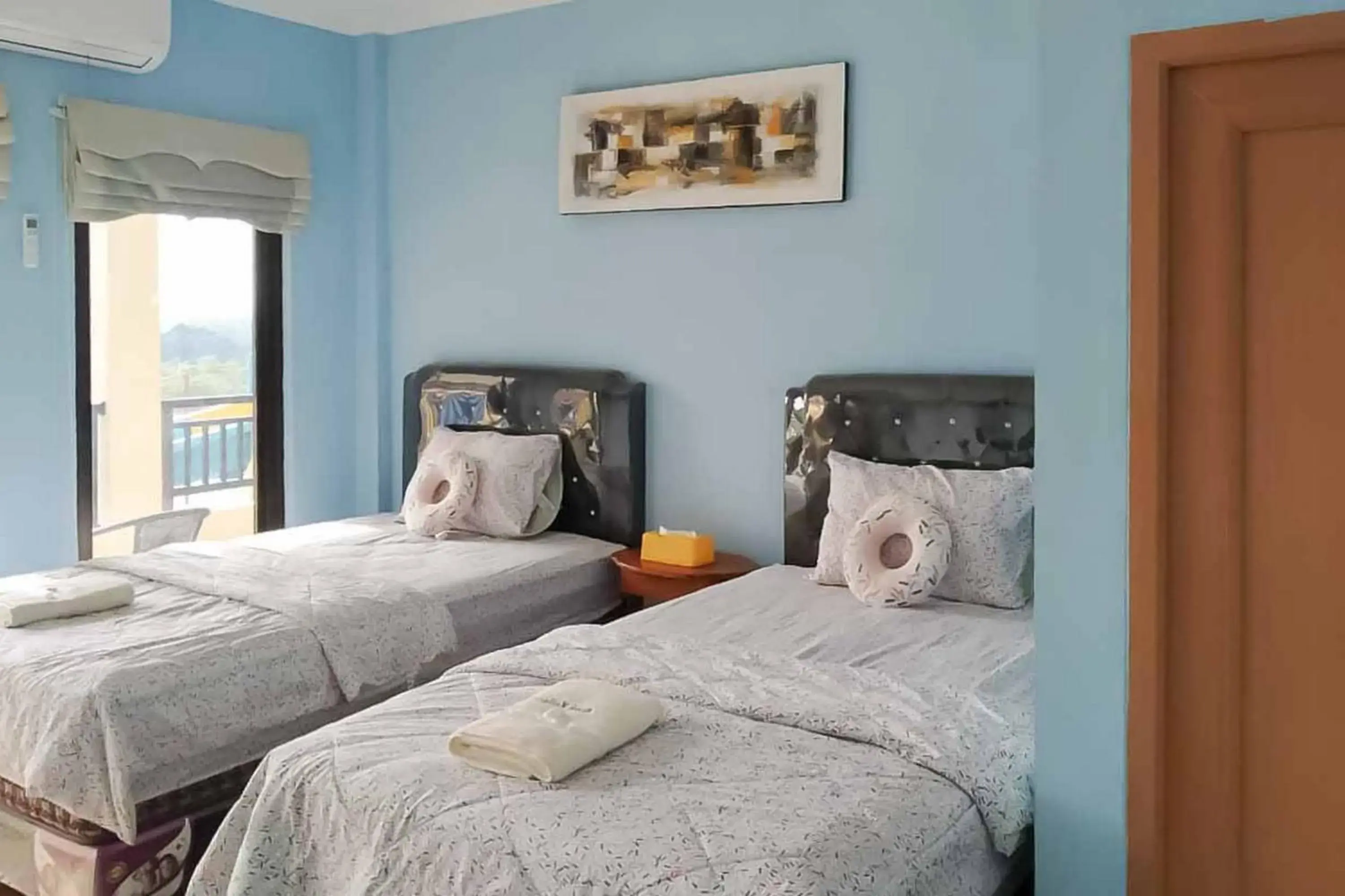 Bed in Kampung Abdi Resort Syariah Mitra RedDoorz Bed in Kampung Abdi Resort Syariah Mitra RedDoorz